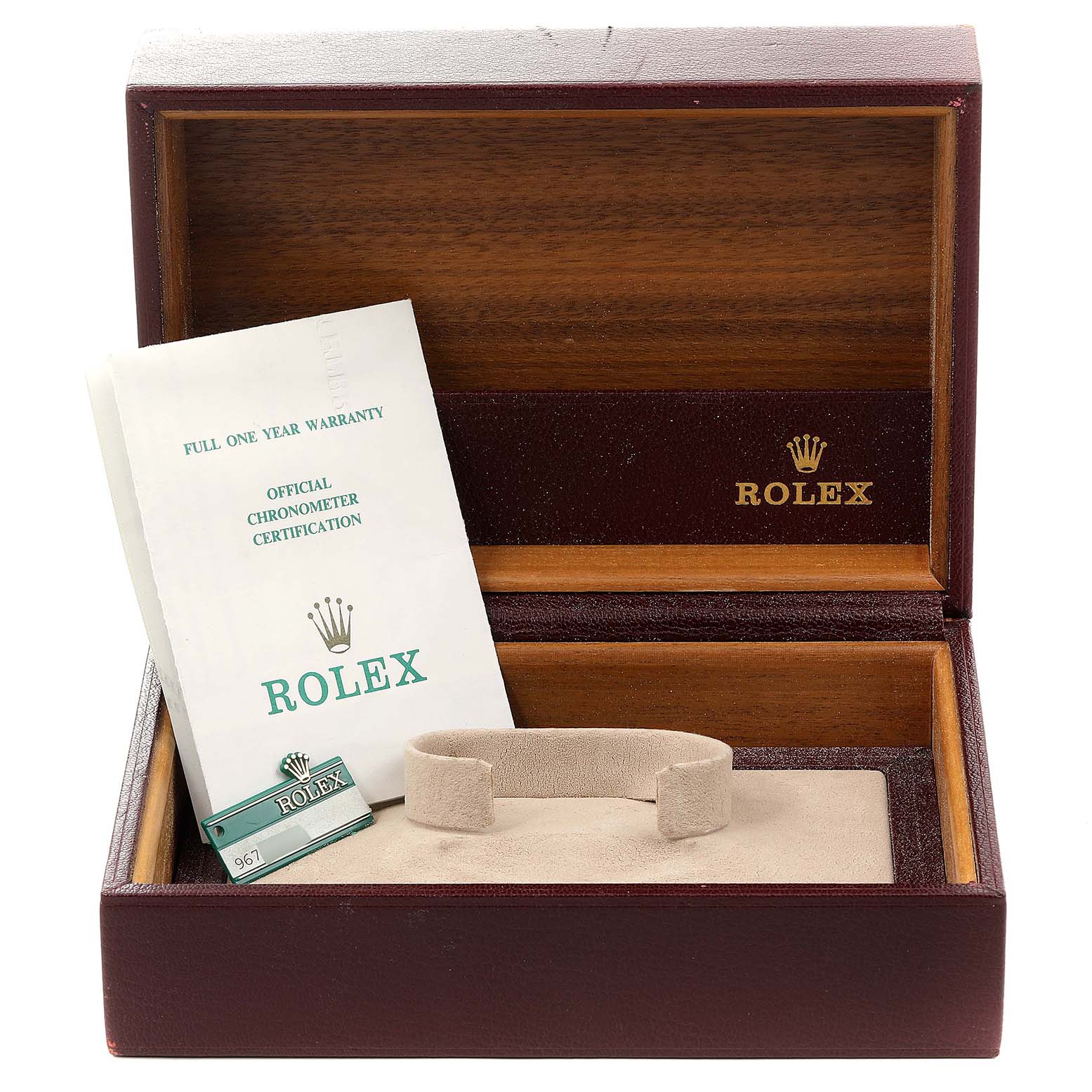 The image shows an open Rolex box for the President model, including the warranty booklet and an official chronometer certification.