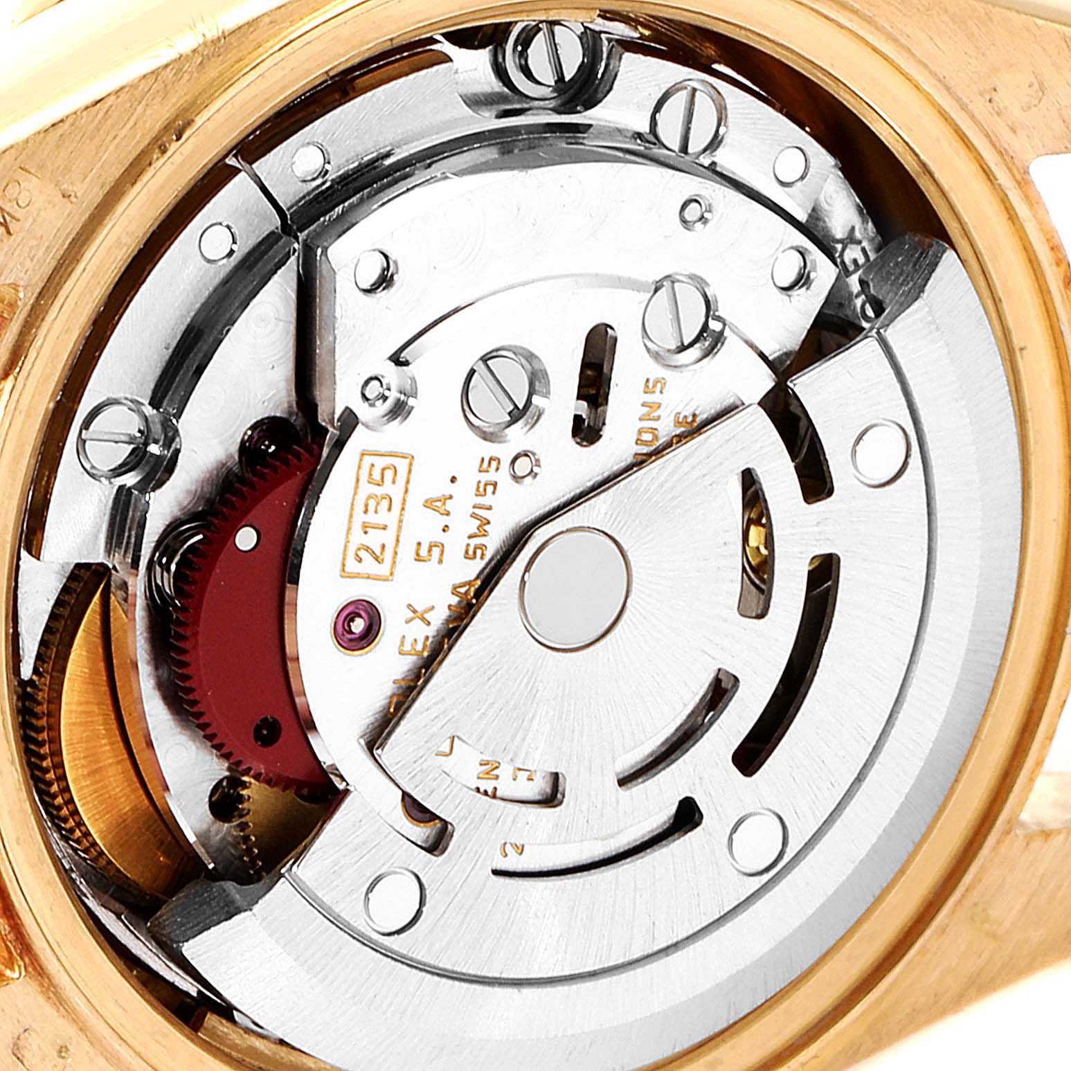 This image shows the internal movement parts of a Rolex President 69138 Women
s Yellow Gold Champagne Dial 69138 Women
s Yellow Gold Champagne Dial model watch, shot from the back.