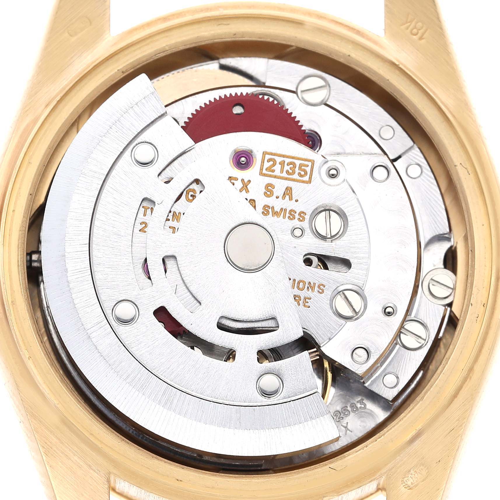 The Rolex President 69258 Women's Yellow Gold Champagne Dial 69258 Women's Yellow Gold Champagne Dial model is shown from the back, featuring its intricate movement components.