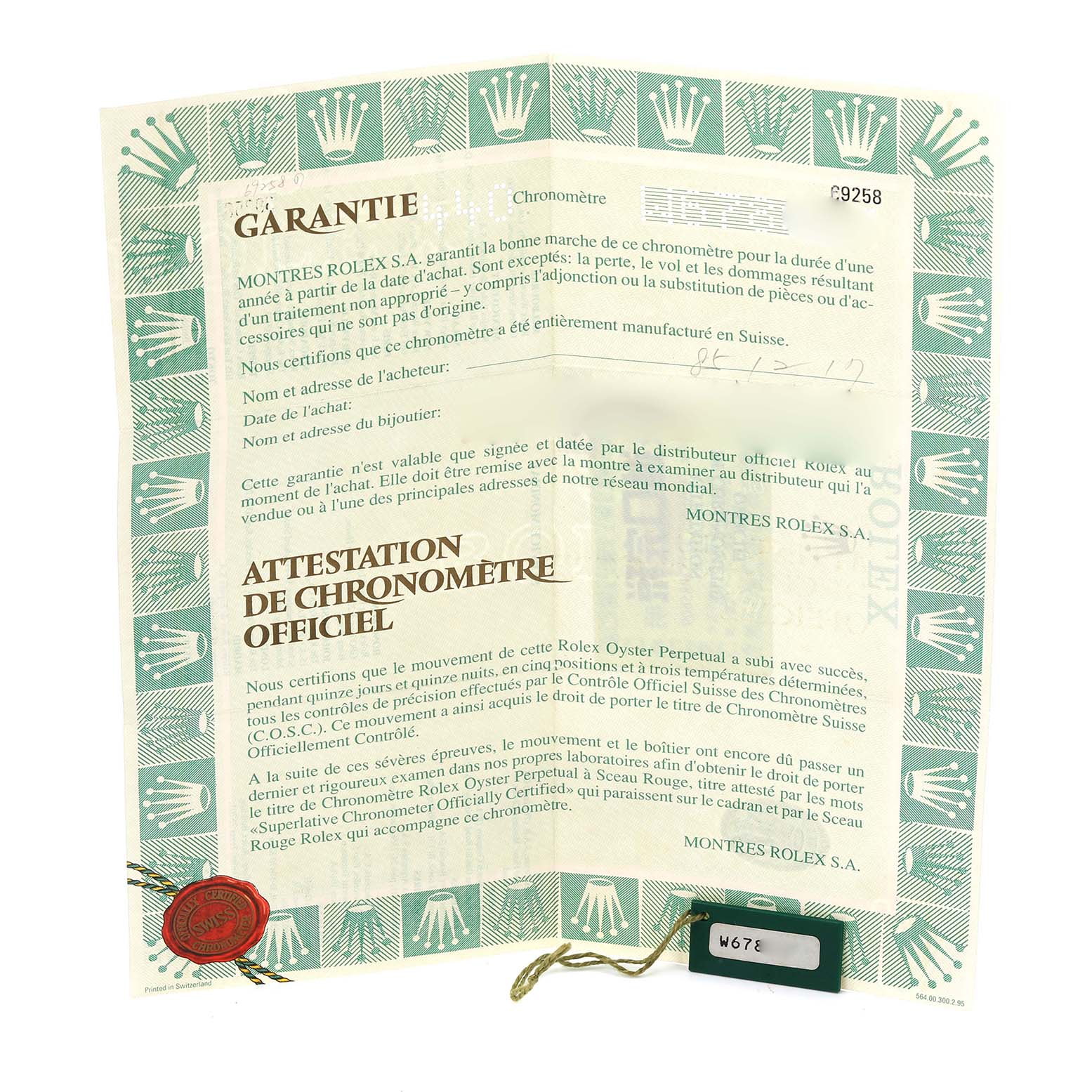 The image shows the warranty and chronometer certificate for a Rolex President 69258 Women's Yellow Gold Champagne Dial 69258 Women's Yellow Gold Champagne Dial model.