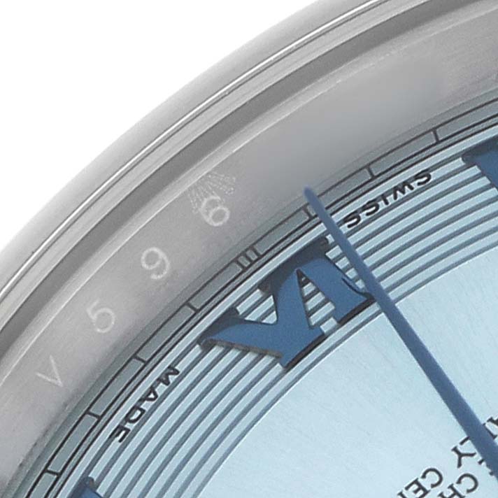 The image shows a close-up of the Rolex President 218206 Men's Platinum Blue Dial watch dial, focusing on the numerals and partial hands.