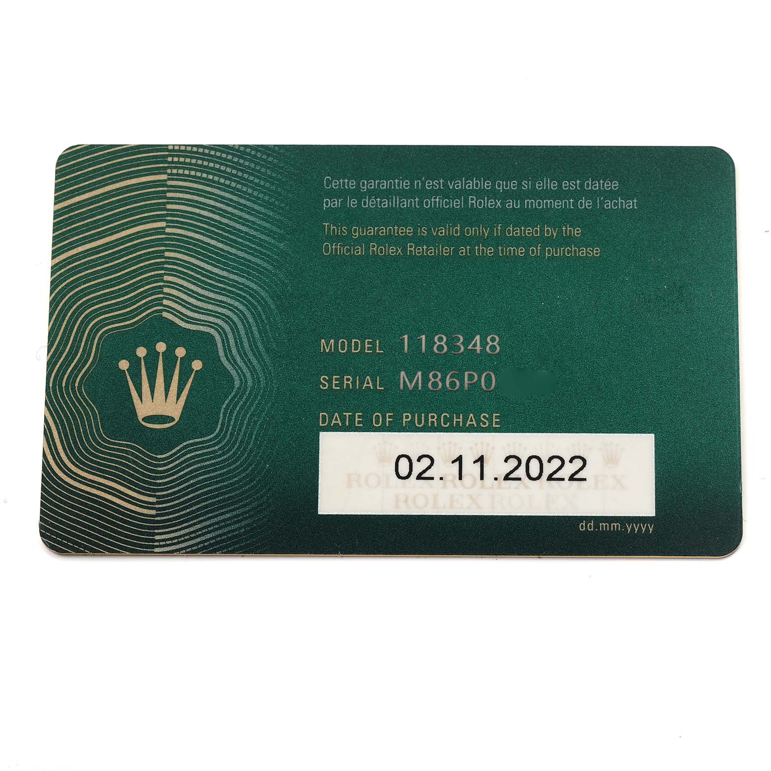 The image shows a warranty card for a Rolex President 118348 Men's Yellow Gold Purple Dial 118348 Men's Yellow Gold Purple Dial model, detailing the serial number and purchase date.