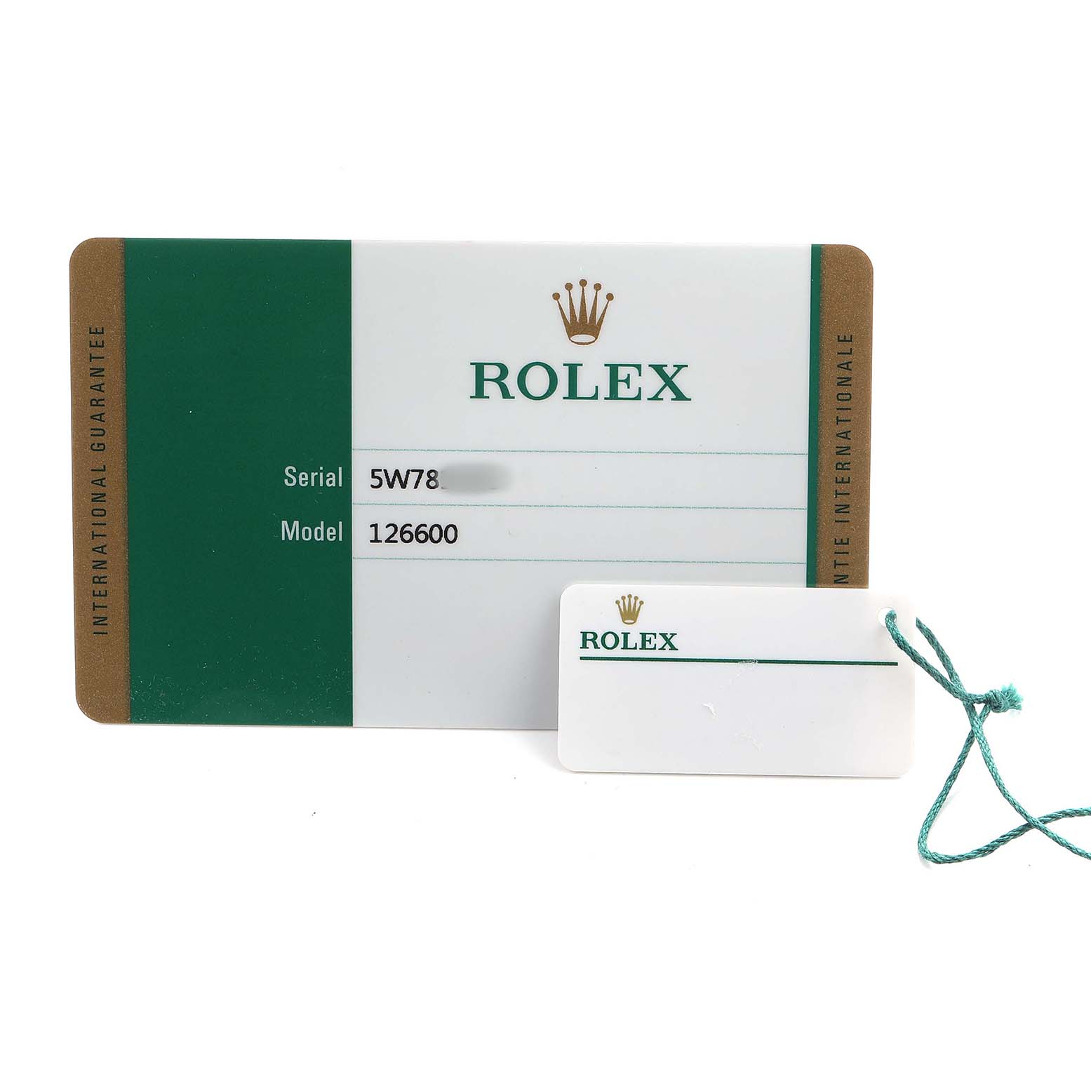 The image shows a Rolex Sea-Dweller 126600 Men's Stainless Steel Black Dial model 126600 warranty card and a tag, laid flat.