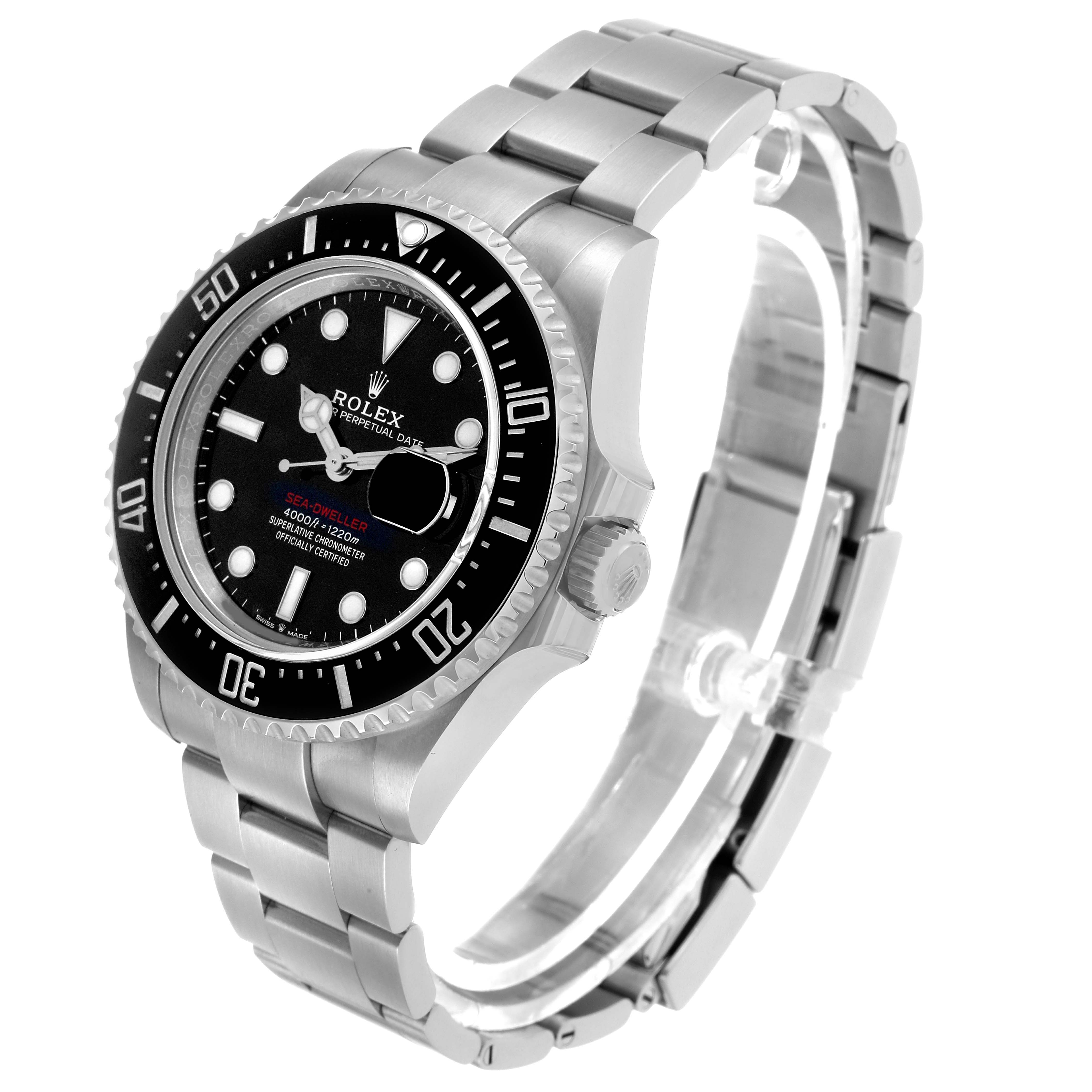 The Rolex Sea-Dweller 126600 Men's Stainless Steel Black Dial watch is shown at a three-quarter angle, highlighting the dial, bezel, crown, and bracelet.