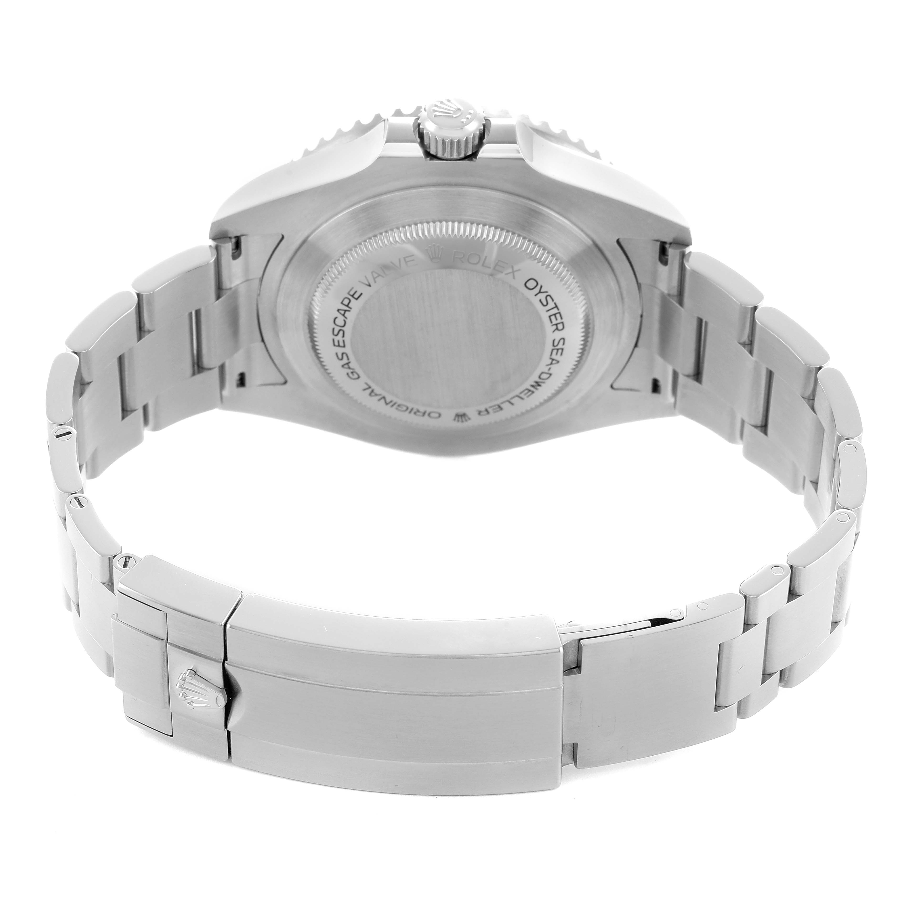 The image shows the back of the Rolex Sea-Dweller 126600 Men's Stainless Steel Black Dial watch, focusing on the case back, crown, and bracelet clasp.