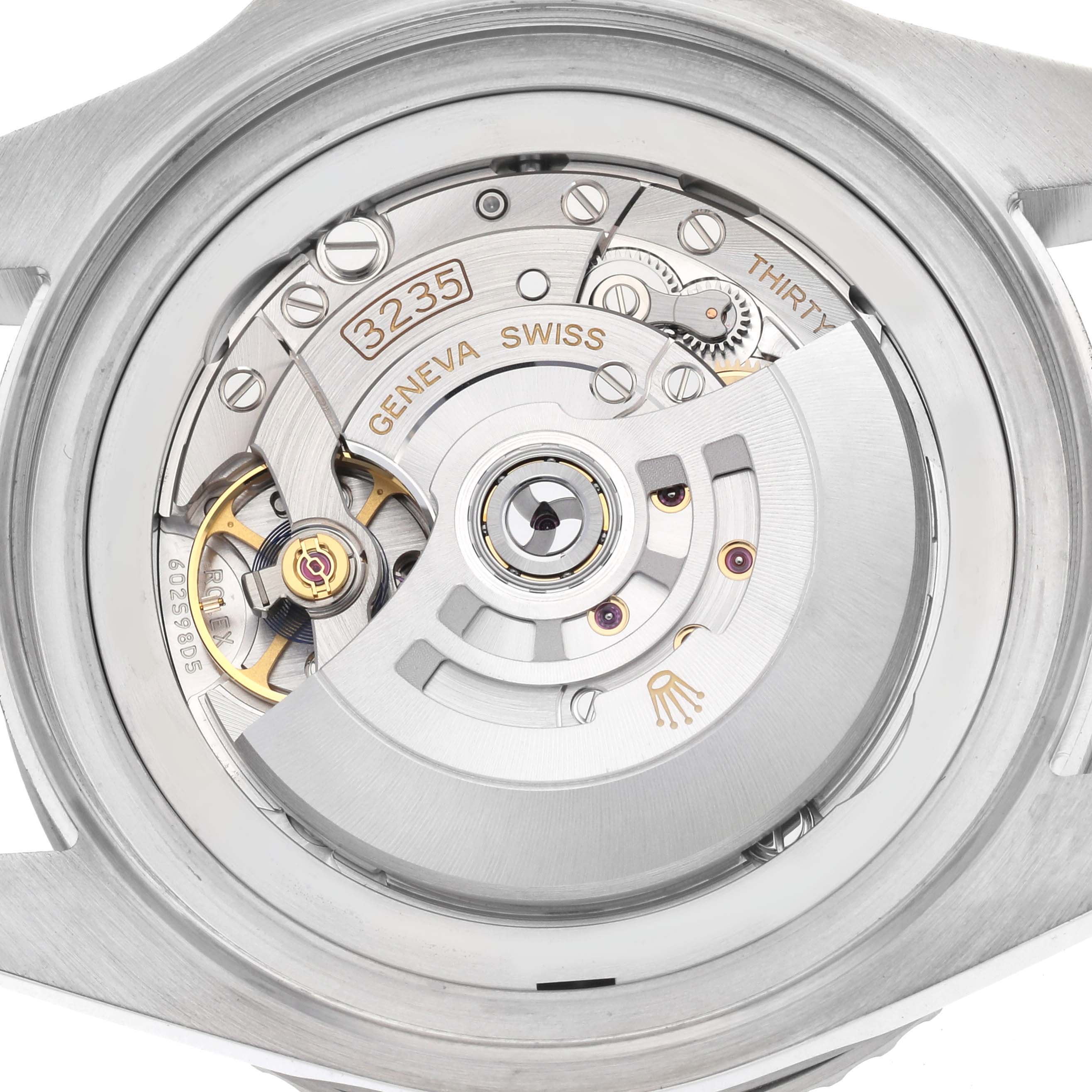 The image shows the movement of a Rolex Sea-Dweller 126660 Men's Stainless Steel Blue Dial, highlighting the rotor and intricate internal mechanics.