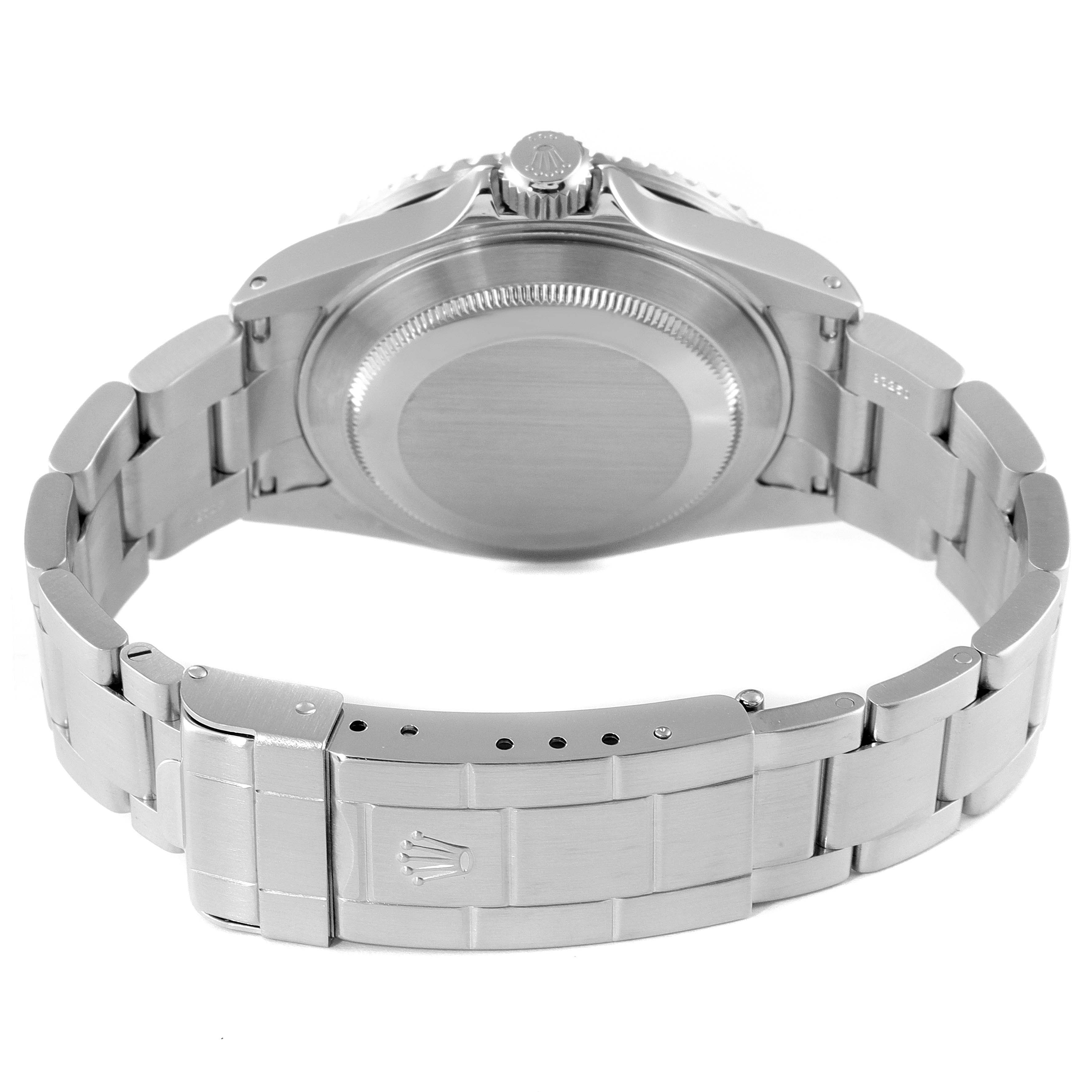 The image shows the back view of a Rolex Submariner 16610 Men's Stainless Steel Black Dial 16610 Men's Stainless Steel Black Dial watch, highlighting its bracelet, clasp, and caseback.