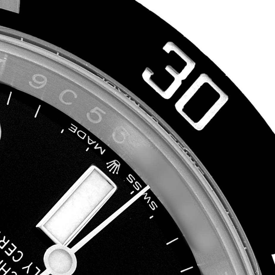 The image shows a close-up of the Rolex Submariner 126610LN Men's Stainless Steel Black Dial's bezel and dial, highlighting the "30" marker.
