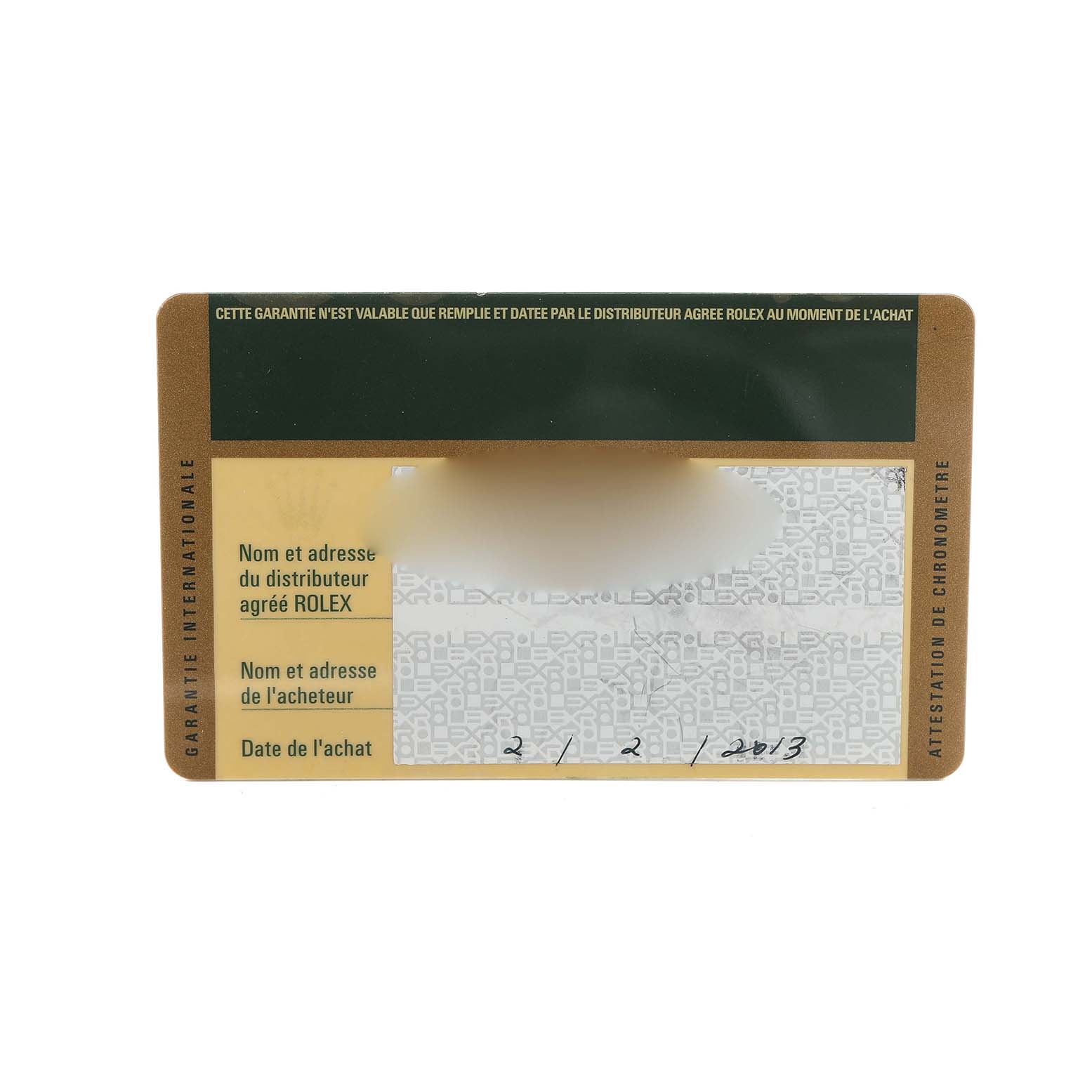 This image shows a warranty card for the Rolex Submariner 116613 Men's Steel and Gold (two tone) Blue Dial, detailing purchase date and dealer information.