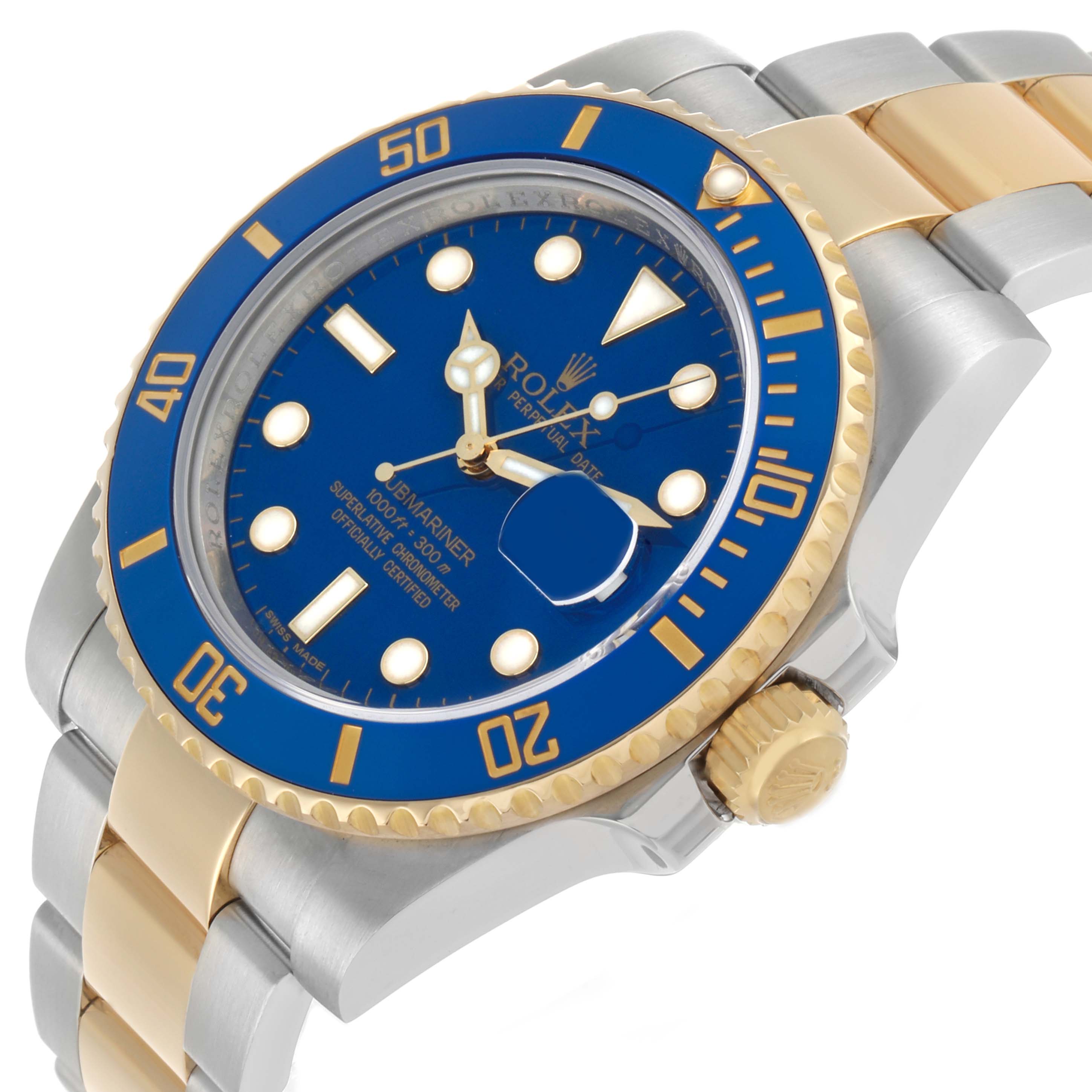 The Rolex Submariner 116613 Men's Steel and Gold (two tone) Blue Dial watch is shown at an angled view highlighting the blue and gold bezel, dial, and the two-tone bracelet.