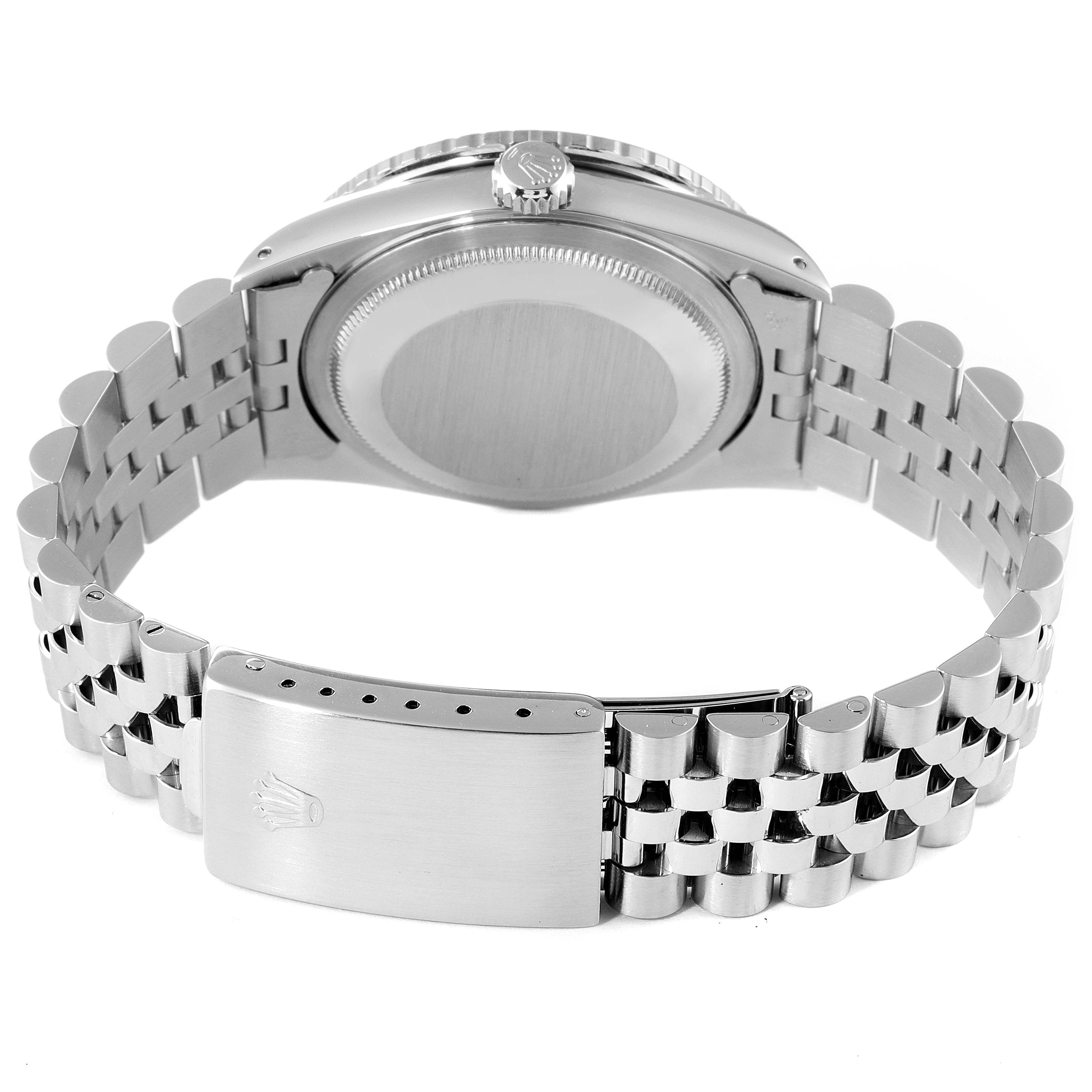 This image shows the back case and bracelet of a Rolex Turn-o-Graph 16264 Men
s Stainless Steel Black Dial 16264 Men
s Stainless Steel Black Dial watch, including the clasp with the Rolex logo.