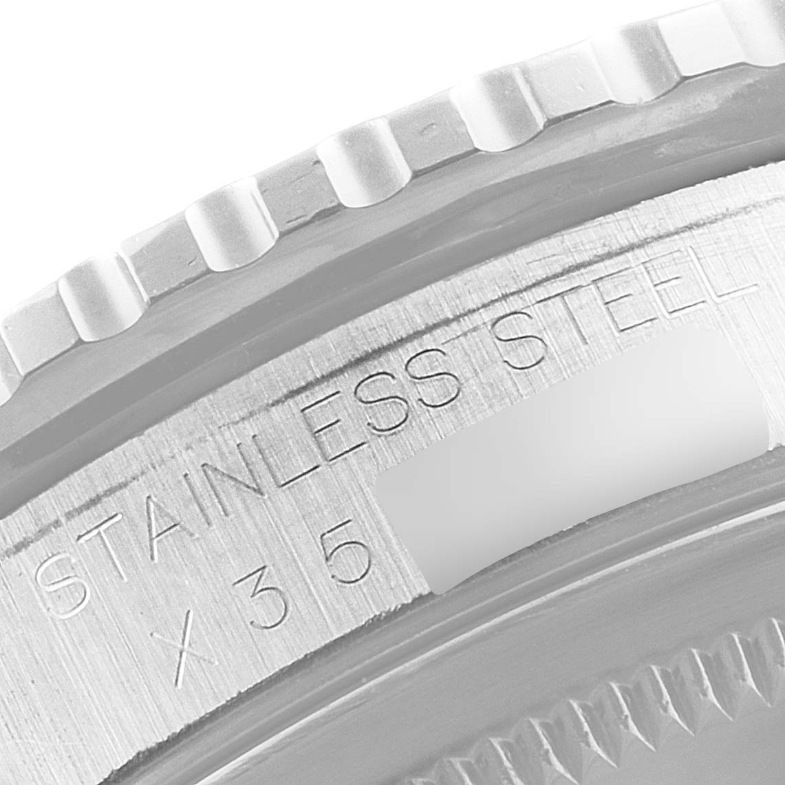 This image shows a close-up of the stainless steel outer bezel and engraved text on a Rolex Turn-o-Graph 16264 Men
s Stainless Steel Black Dial 16264 Men
s Stainless Steel Black Dial watch.