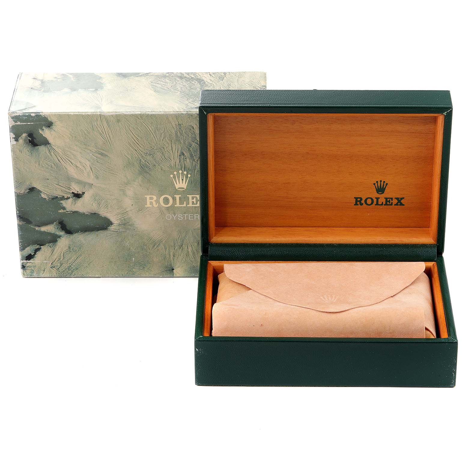 The image shows a Rolex Turn-o-Graph 16264 Men
s Stainless Steel Black Dial 16264 Men
s Stainless Steel Black Dial watch box and packaging from a front angle, with the inner box open displaying a wrapped item.