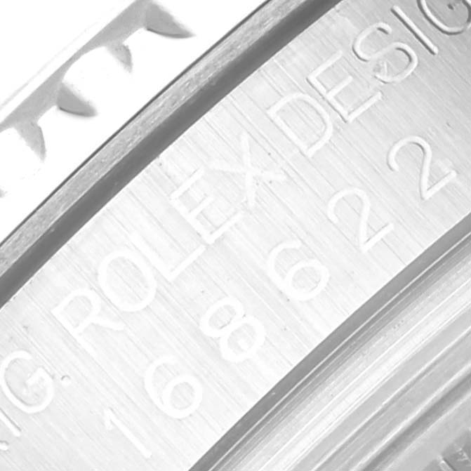 The close-up image shows the engraved side of the bezel and casing of the Rolex Yacht-Master 168622 Men's Stainless Steel Silver Dial 168622 Men's Stainless Steel Silver Dial watch.