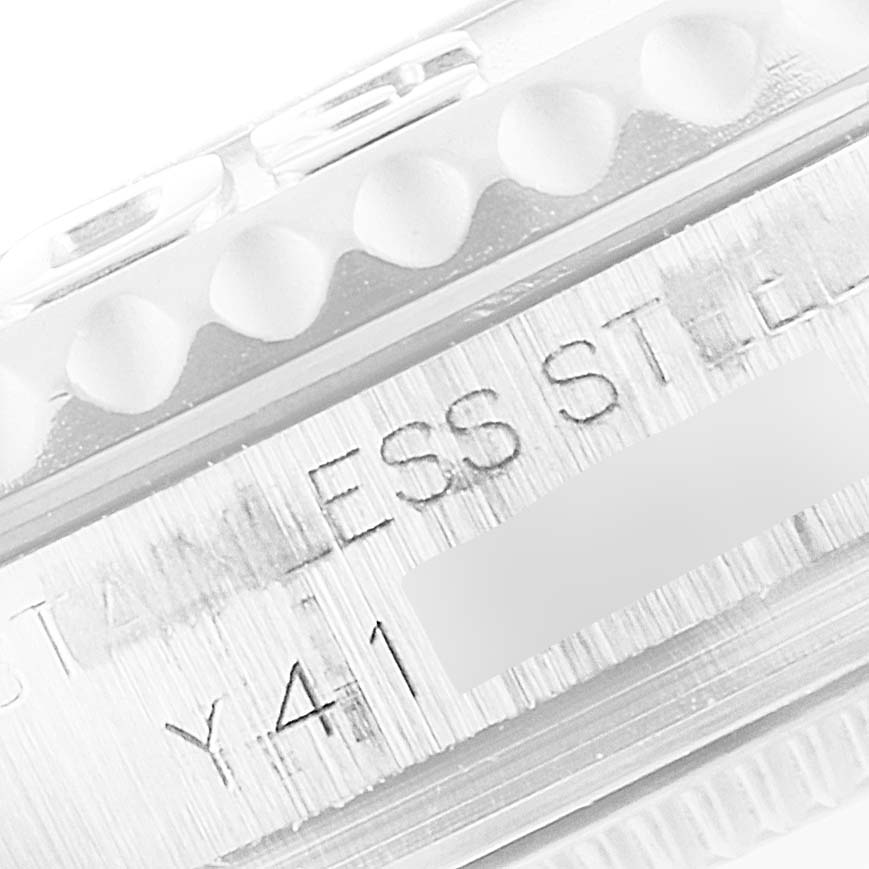 The image shows a close-up of the bezel and part of the case with engravings of the Rolex Yacht-Master 168622 Men
s Stainless Steel Silver Dial 168622 Men
s Stainless Steel Silver Dial watch.