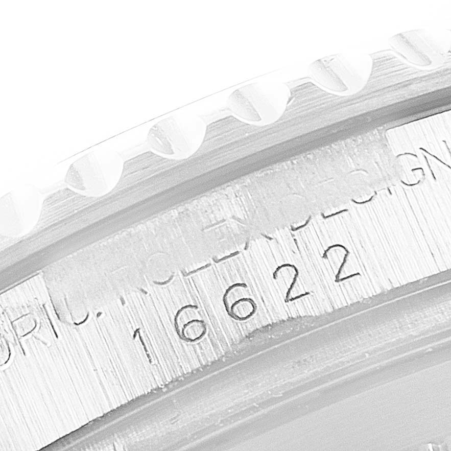 This close-up image shows the bezel and engraved serial number part of a Rolex Yacht-Master 16622 Men
s Stainless Steel Silver Dial 16622 Men
s Stainless Steel Silver Dial watch.