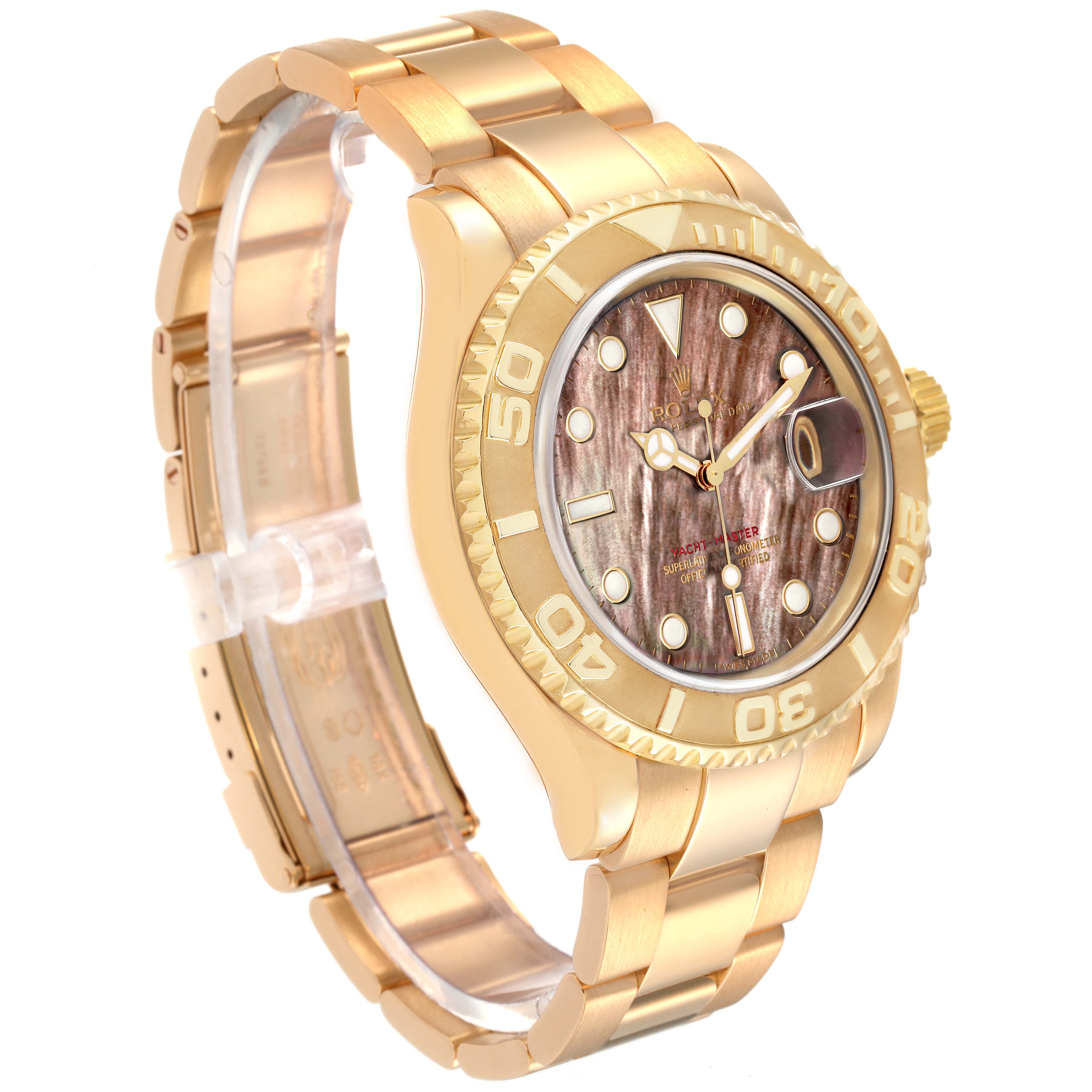 The Rolex Yacht-Master 16628 Men's Yellow Gold Mother of Pearl Dial 16628 Men's Yellow Gold Mother of Pearl Dial watch is shown at a slight side angle, showcasing its gold bracelet, bezel, and brown dial.