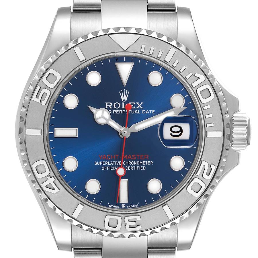 The Rolex Yacht-Master watch is shown from the front, highlighting its blue dial, bezel, and bracelet.