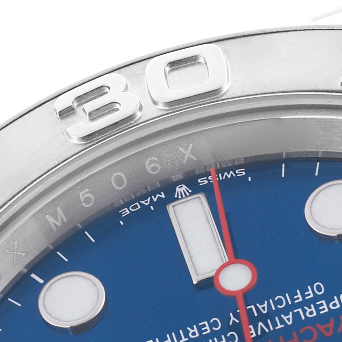 The image shows a partial side view of the Rolex Yacht-Master 126622 Men's Stainless Steel Blue Dial 126622 Men's Stainless Steel Blue Dial, focusing on the bezel and part of the blue dial.