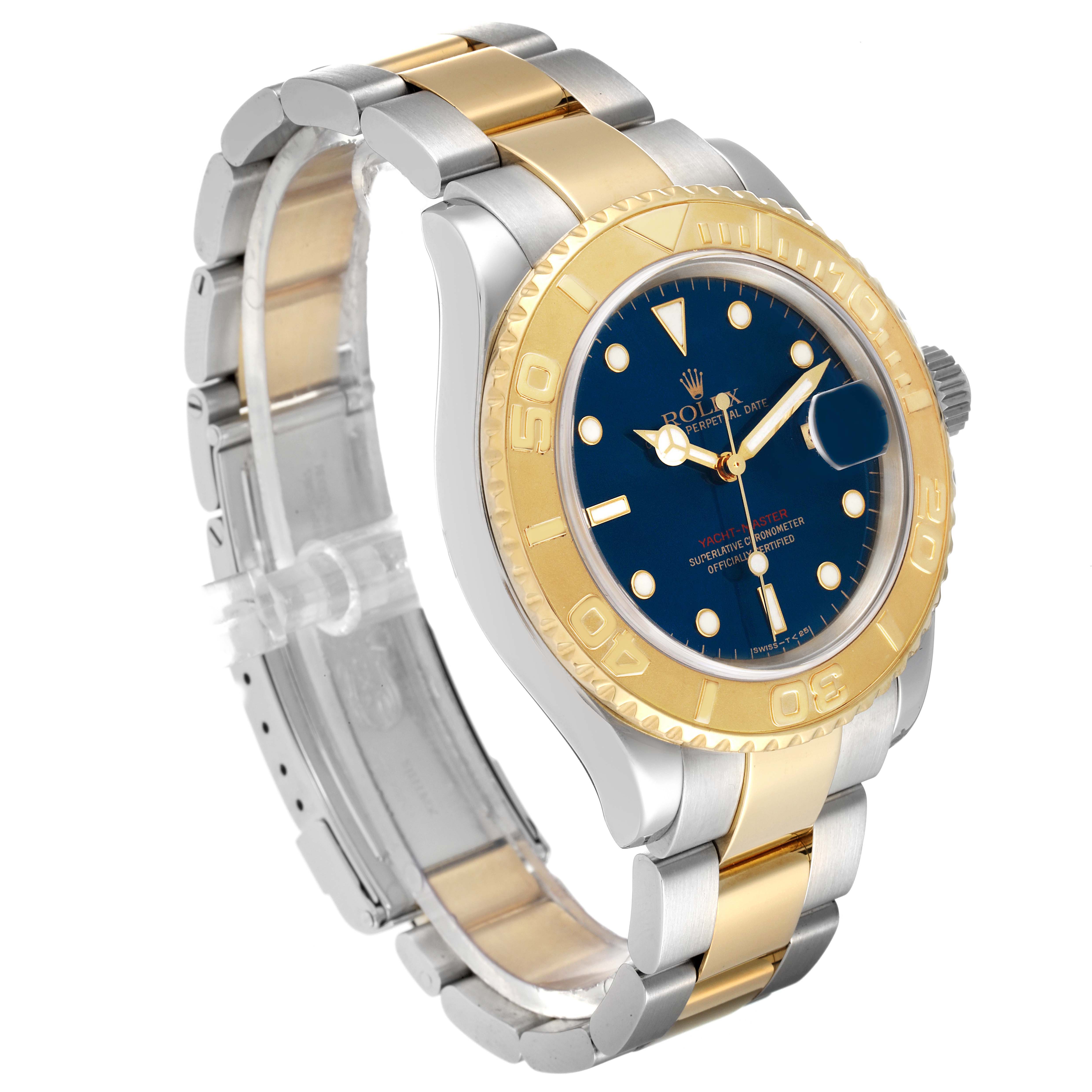 The image shows a three-quarter angle of the Rolex Yacht-Master 16623 Men's Steel and Gold (two tone) Blue Dial 16623 Men's Steel and Gold (two tone) Blue Dial watch, displaying its dial, bezel, and bracelet.