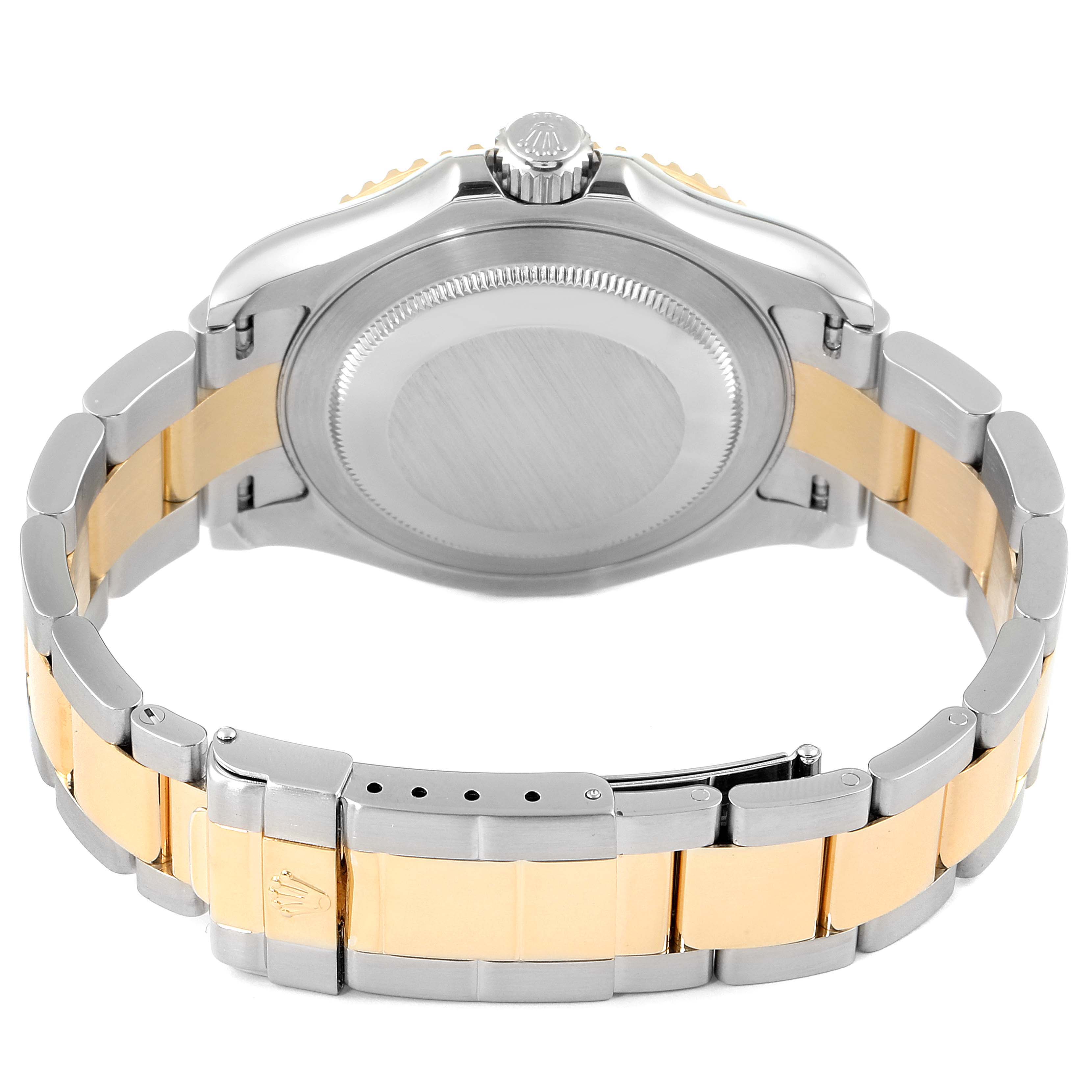 The image shows the back and bracelet of a Rolex Yacht-Master 16623 Men's Steel and Gold (two tone) Mother of Pearl Dial 16623 Men's Steel and Gold (two tone) Mother of Pearl Dial watch, highlighting its two-tone metal design.