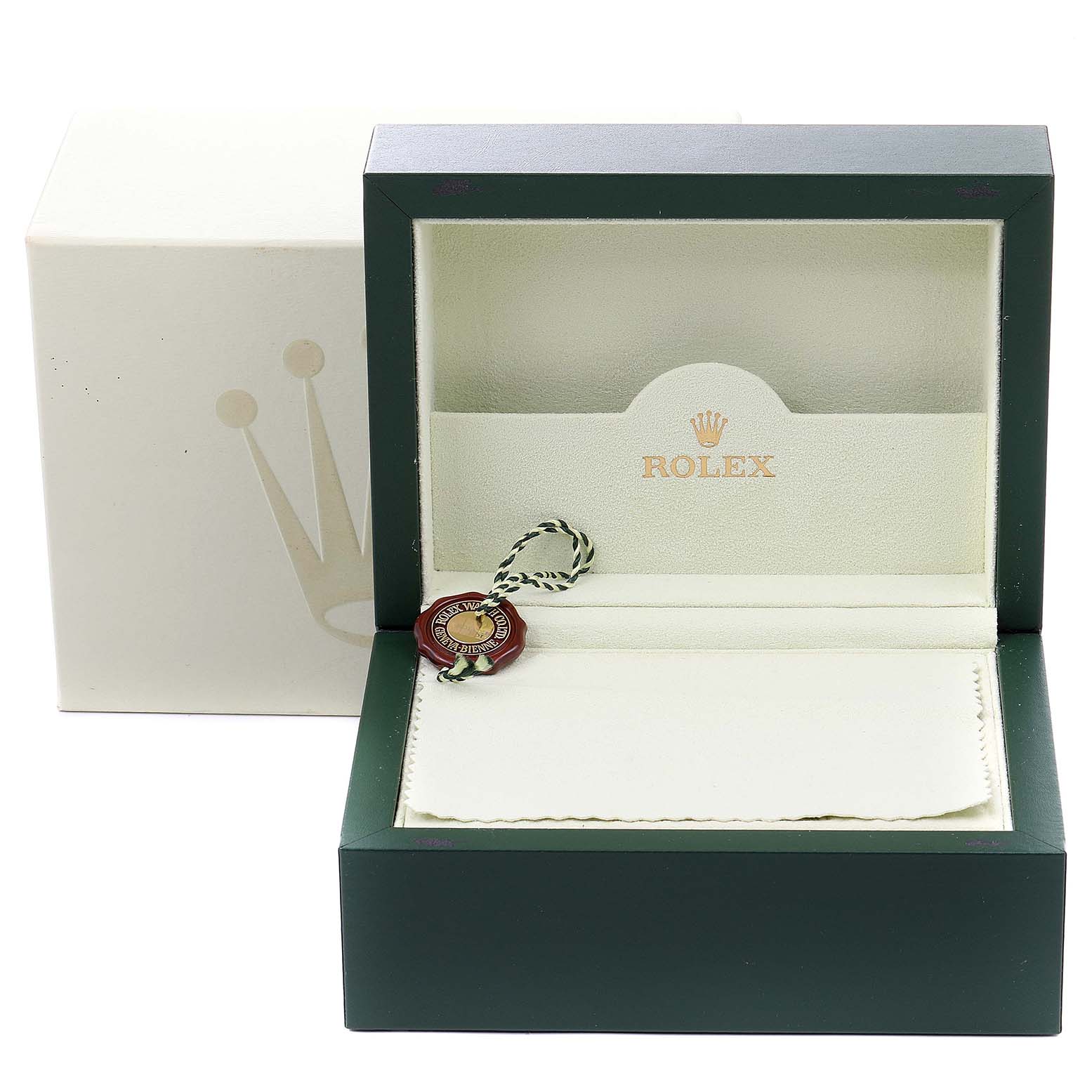 The image shows the open box of a Rolex Yacht-Master 16623 Men's Steel and Gold (two tone) White Dial 16623 Men's Steel and Gold (two tone) White Dial, revealing the inner packaging and a tag, viewed from the front.