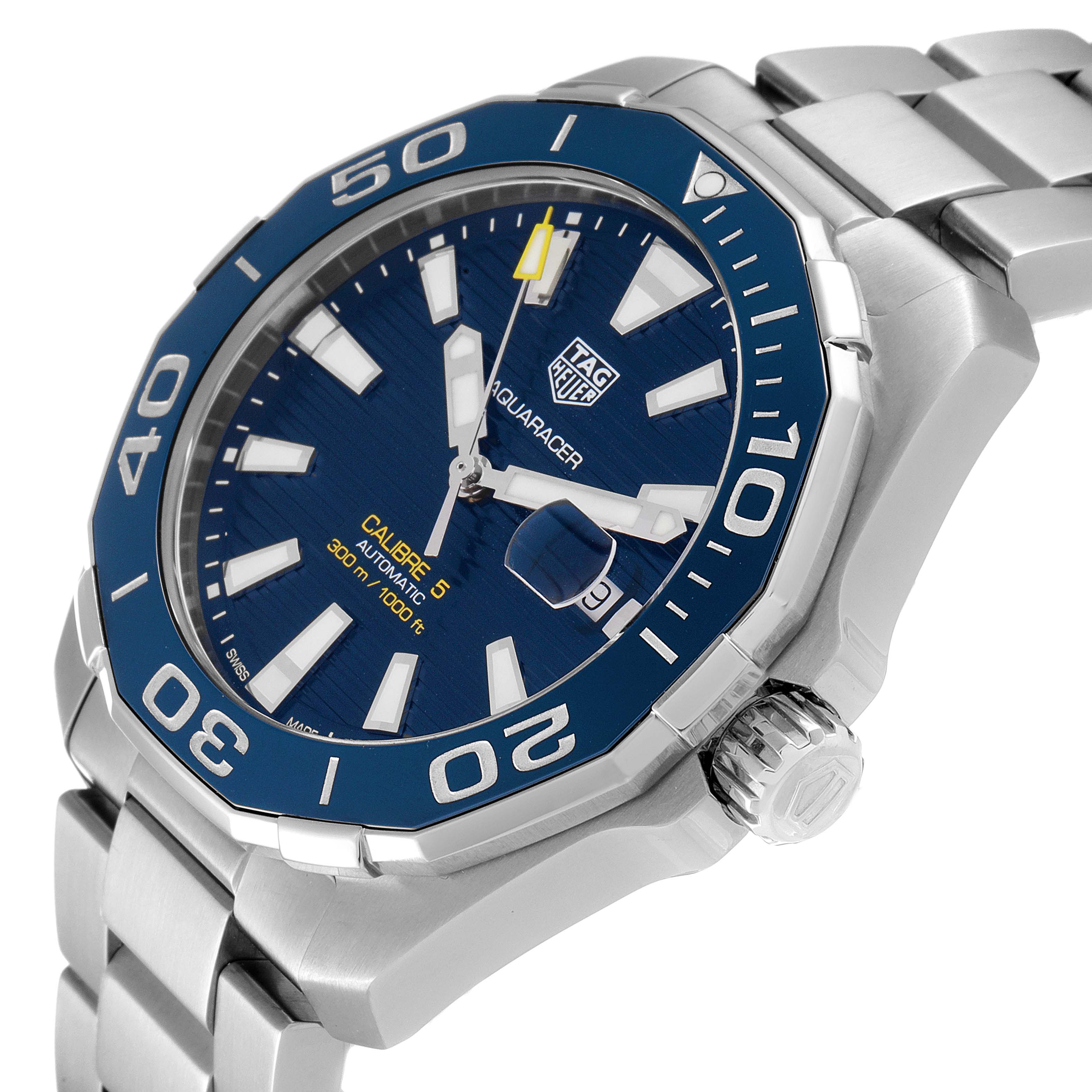 The image shows a Tag Heuer Aquaracer WAY201B Men
s Stainless Steel Blue Dial WAY201B Men
s Stainless Steel Blue Dial watch at an angle displaying its blue dial, bezel, crown, and metal bracelet.