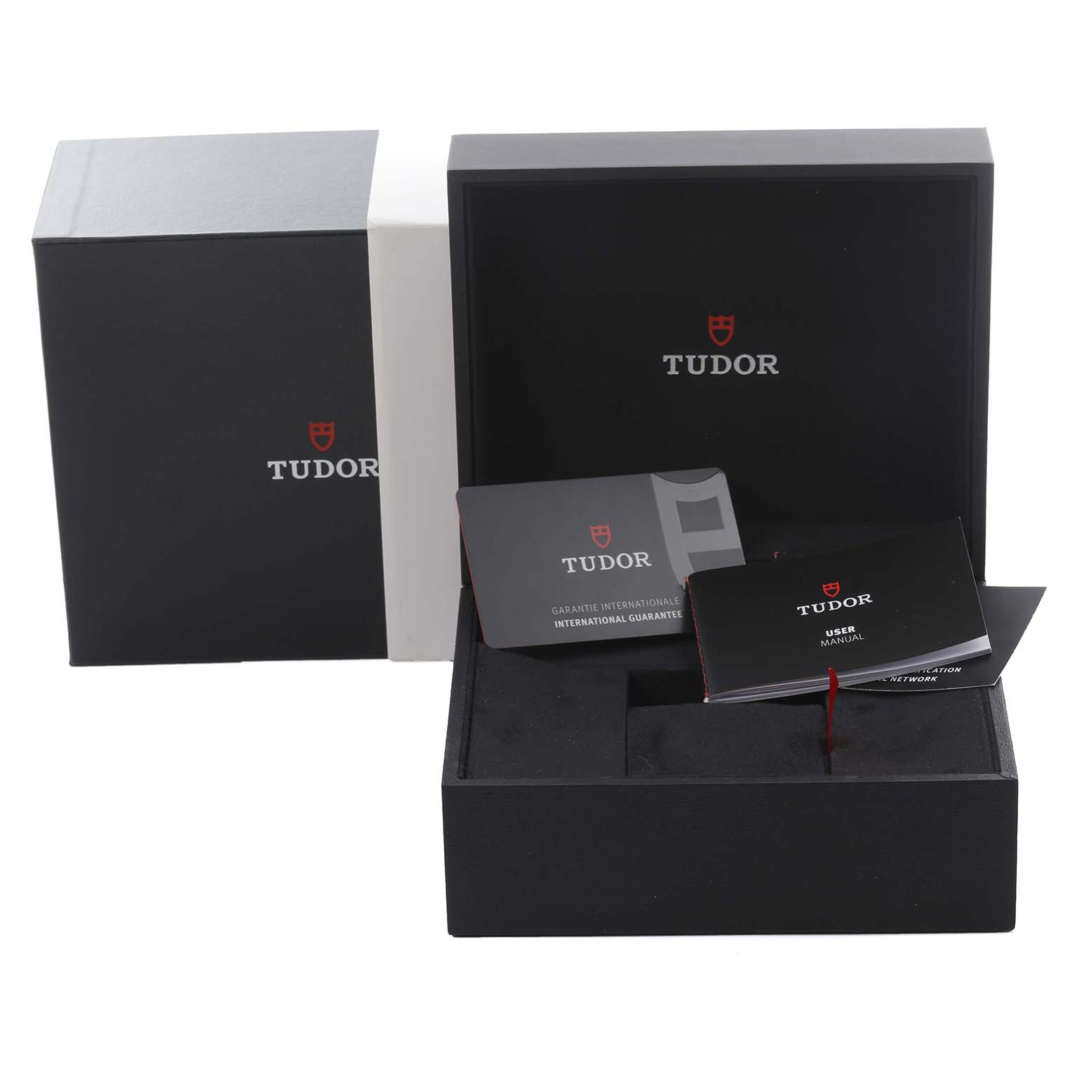 The image shows Tudor Heritage Black Bay 79030B Men
s Stainless Steel Blue Dial 79030B Men
s Stainless Steel Blue Dial packaging, including the box, manual, and warranty card.