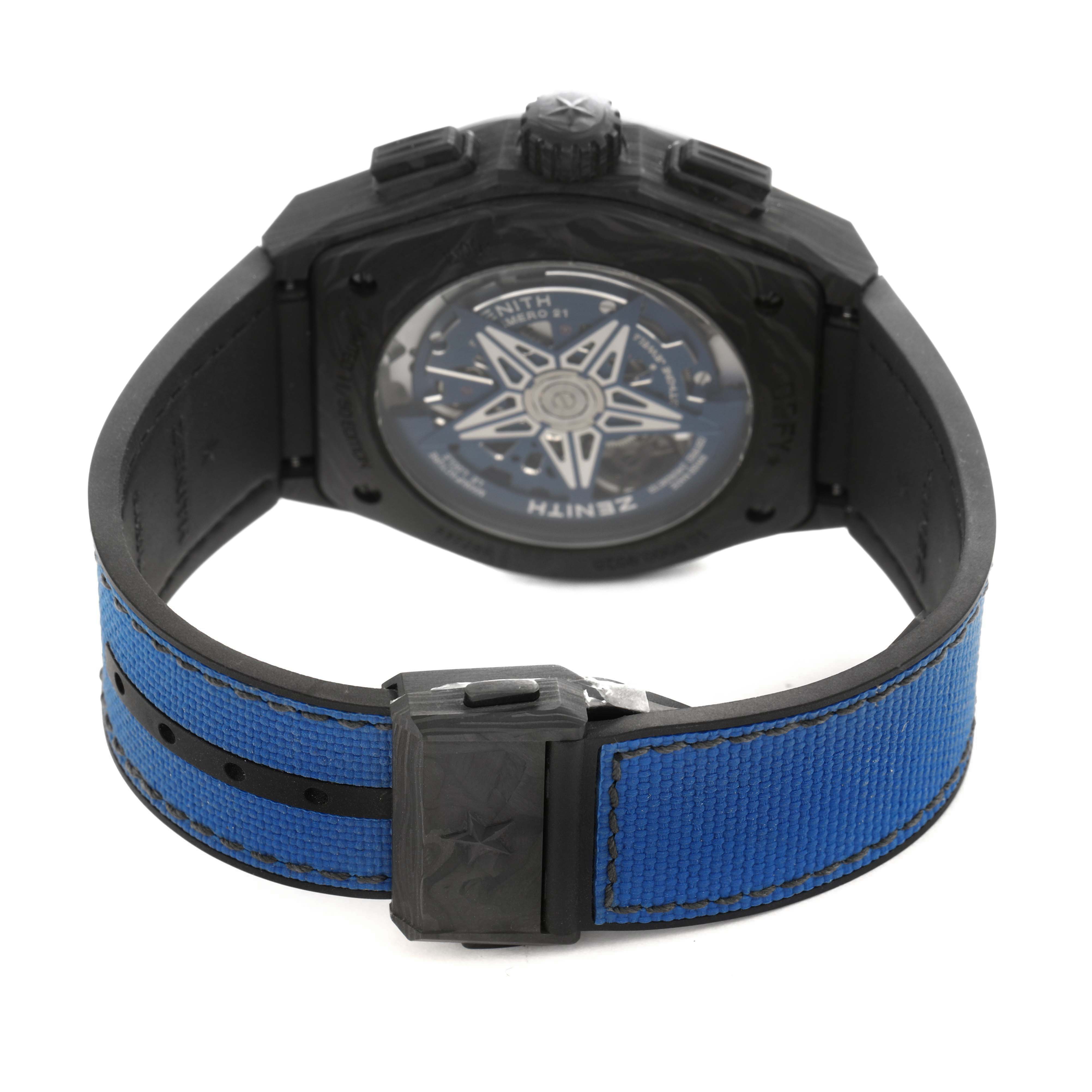 The image shows the back of the Zenith Defy 10.9000.9020/79.R918 Men's Titanium Blue Dial watch, highlighting the case back, strap, and buckle in a rear angle.