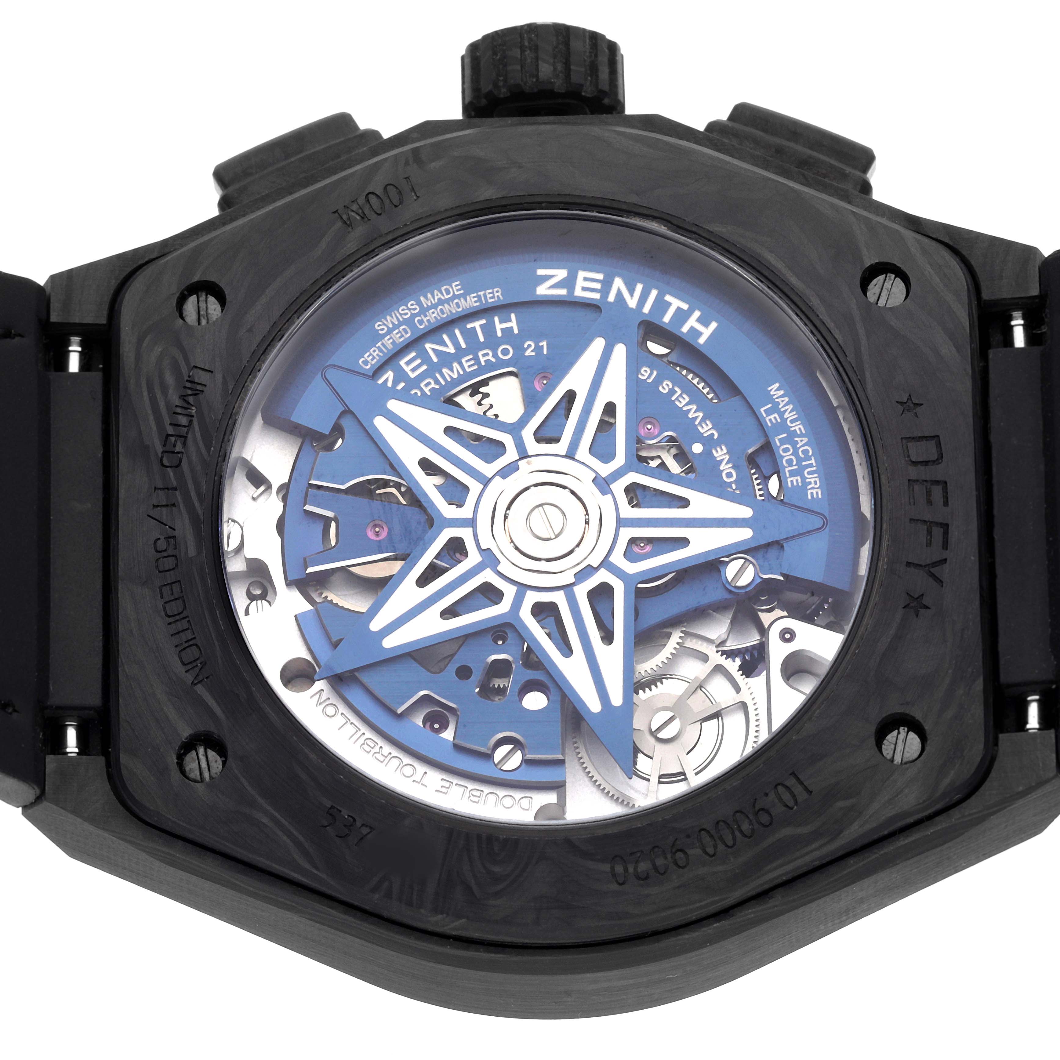 The image shows the back of a Zenith Defy 10.9000.9020/79.R918 Men's Titanium Blue Dial watch, highlighting its intricate movement and visible components.