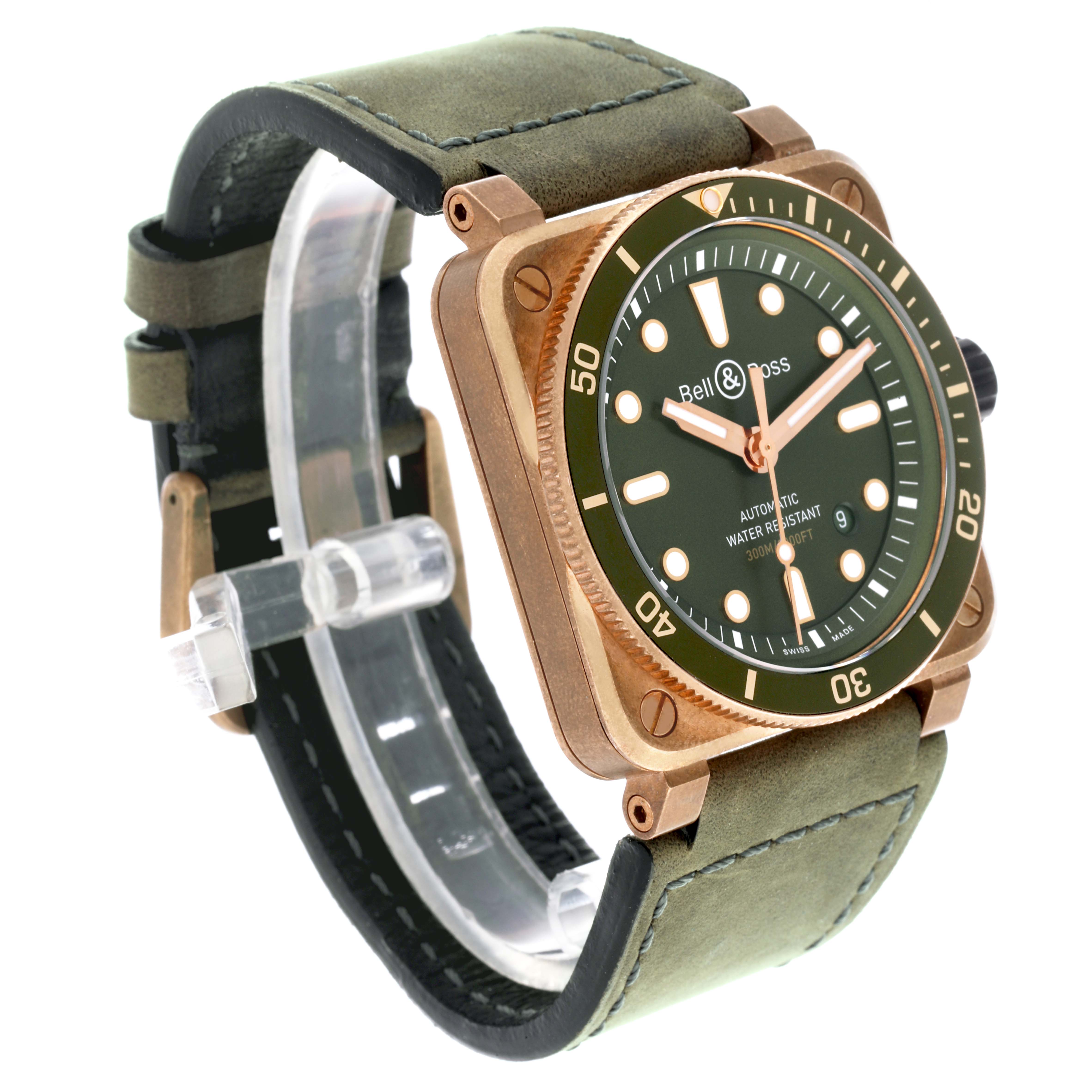 The Bell 
Ross Instruments BR03-92-DIV-B Men
s Bronze Green Dial BR03-92-DIV-B Men
s Bronze Green Dial watch is shown at an angle displaying the case, bezel, dial, and part of the strap.
