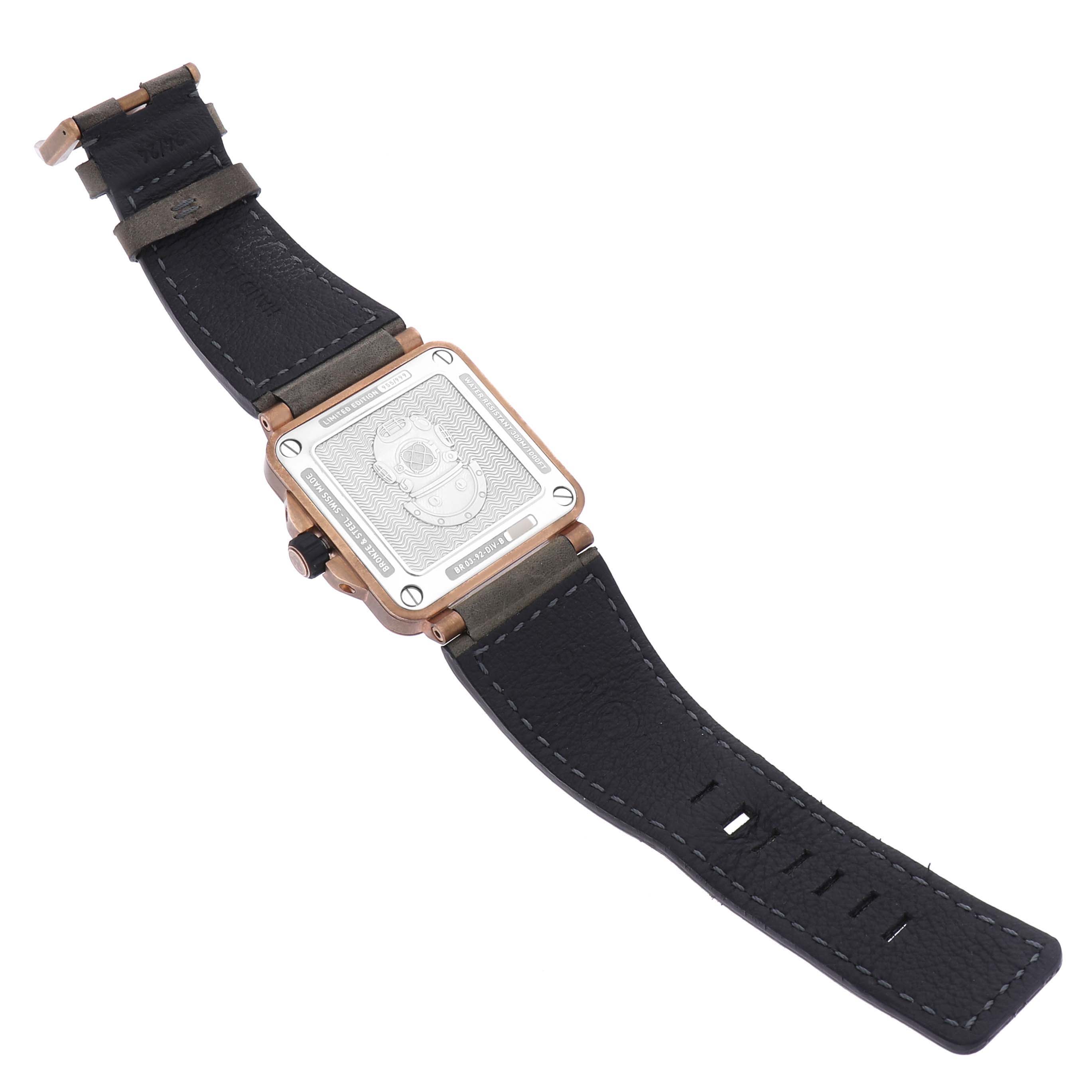 The Bell 
Ross Instruments BR03-92-DIV-B Men
s Bronze Green Dial BR03-92-DIV-B Men
s Bronze Green Dial watch is displayed from the back, showing its case, leather strap, and engraved case back design.