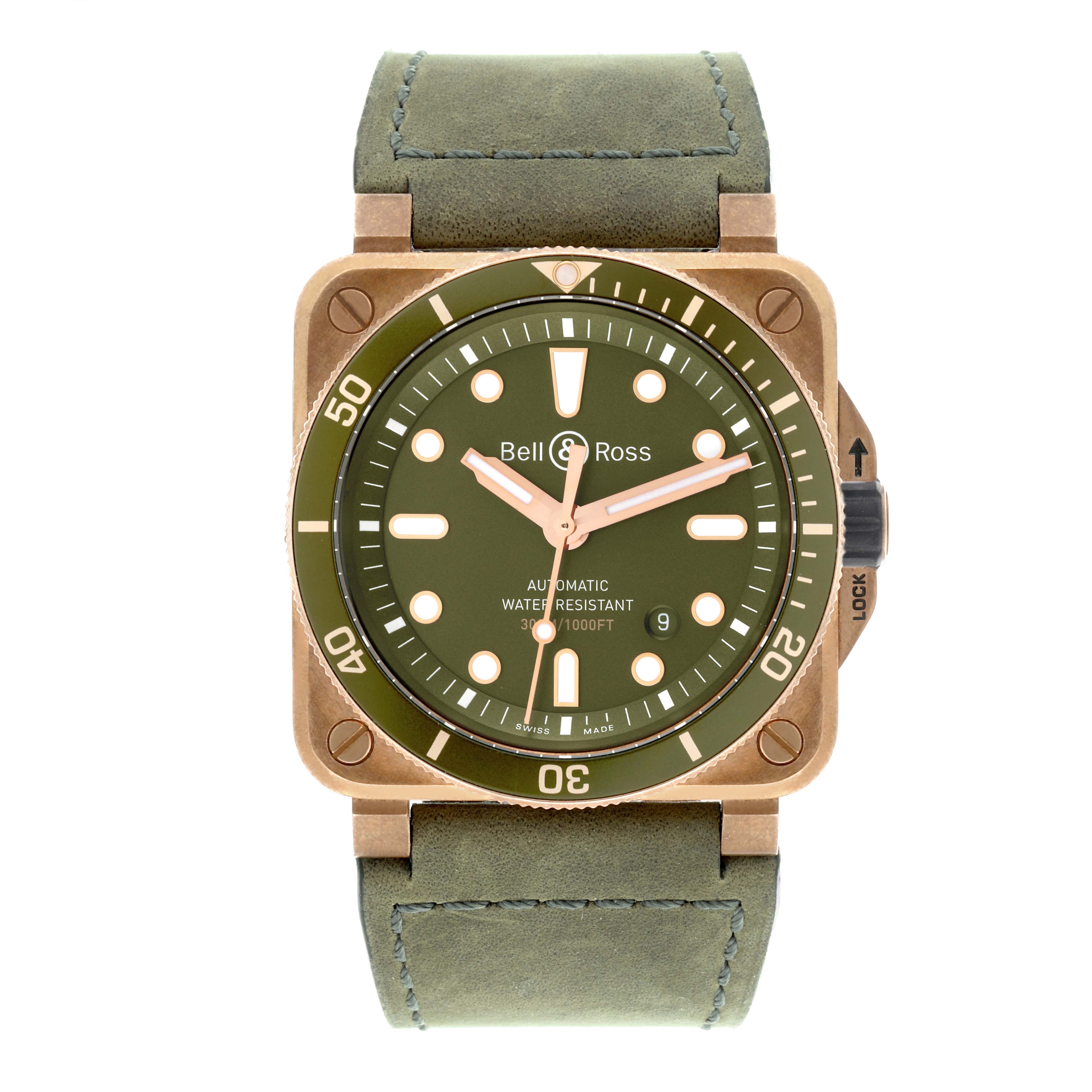 The Bell 
Ross Instruments BR03-92-DIV-B Men
s Bronze Green Dial BR03-92-DIV-B Men
s Bronze Green Dial model watch is shown from a front angle, displaying its face, strap, and bezel.