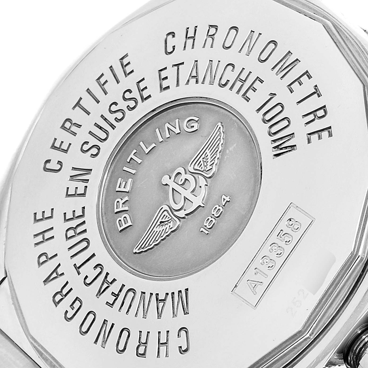 The image shows a close-up of the case back of a Breitling Windrider A13358 Men's Stainless Steel Mother of Pearl Dial A13358 Men's Stainless Steel Mother of Pearl Dial watch, featuring engraved details and the Breitling logo.