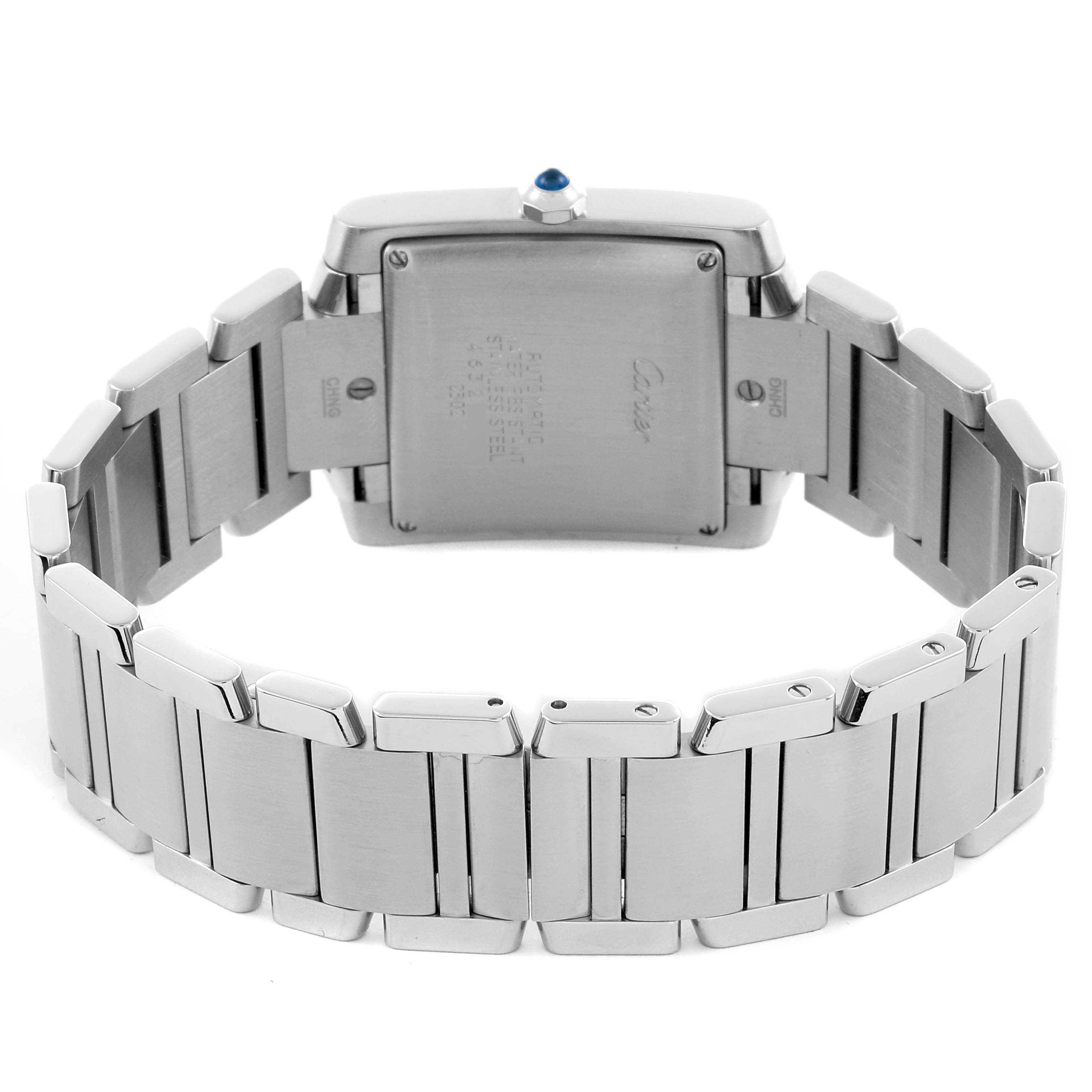 The Cartier Tank Française watch is shown from the back, highlighting the case back and metal bracelet.