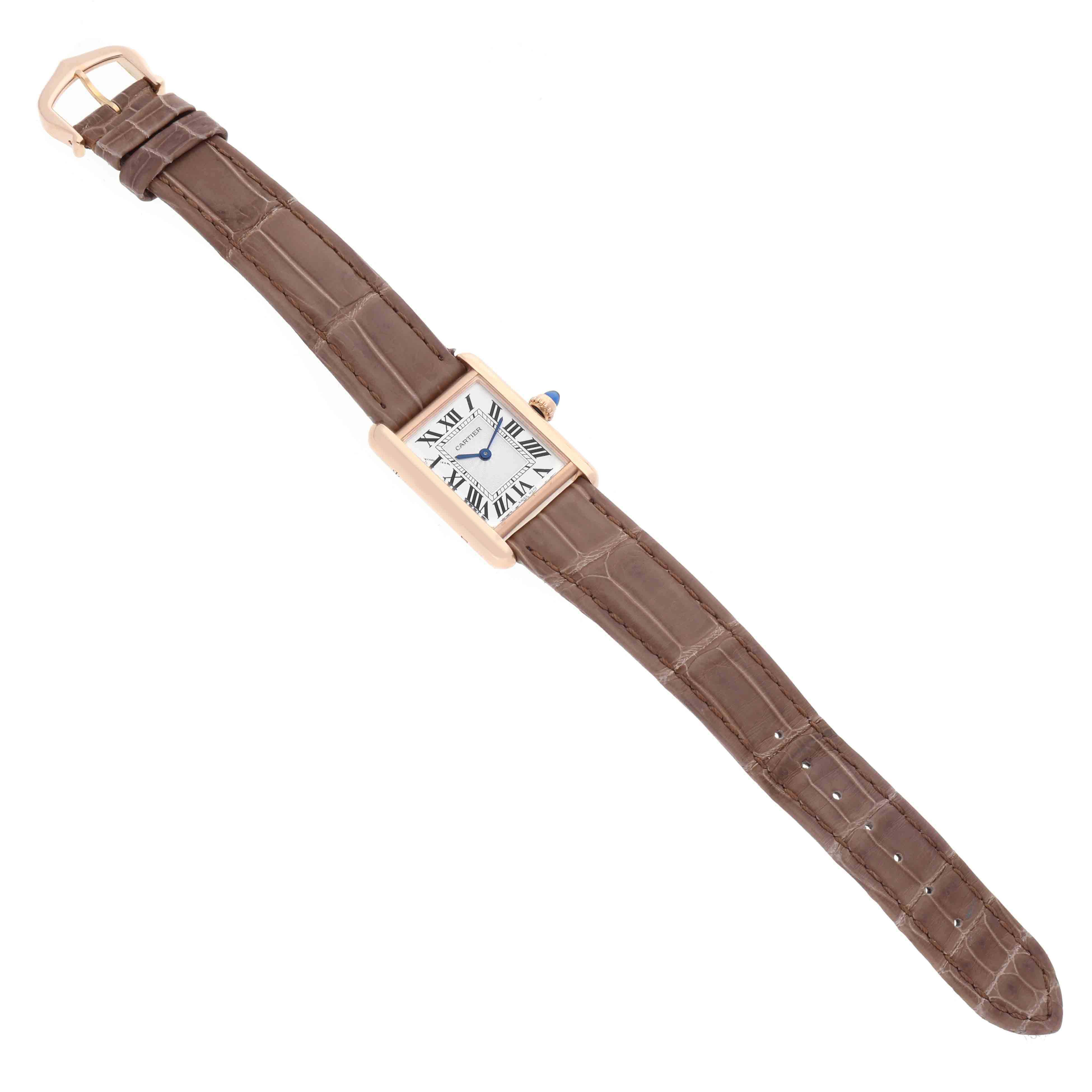 The Cartier Tank Louis WGTA0010 Women's Rose Gold Silver Dial is shown at a slight angle, featuring the watch face, brown leather strap, and gold buckle.