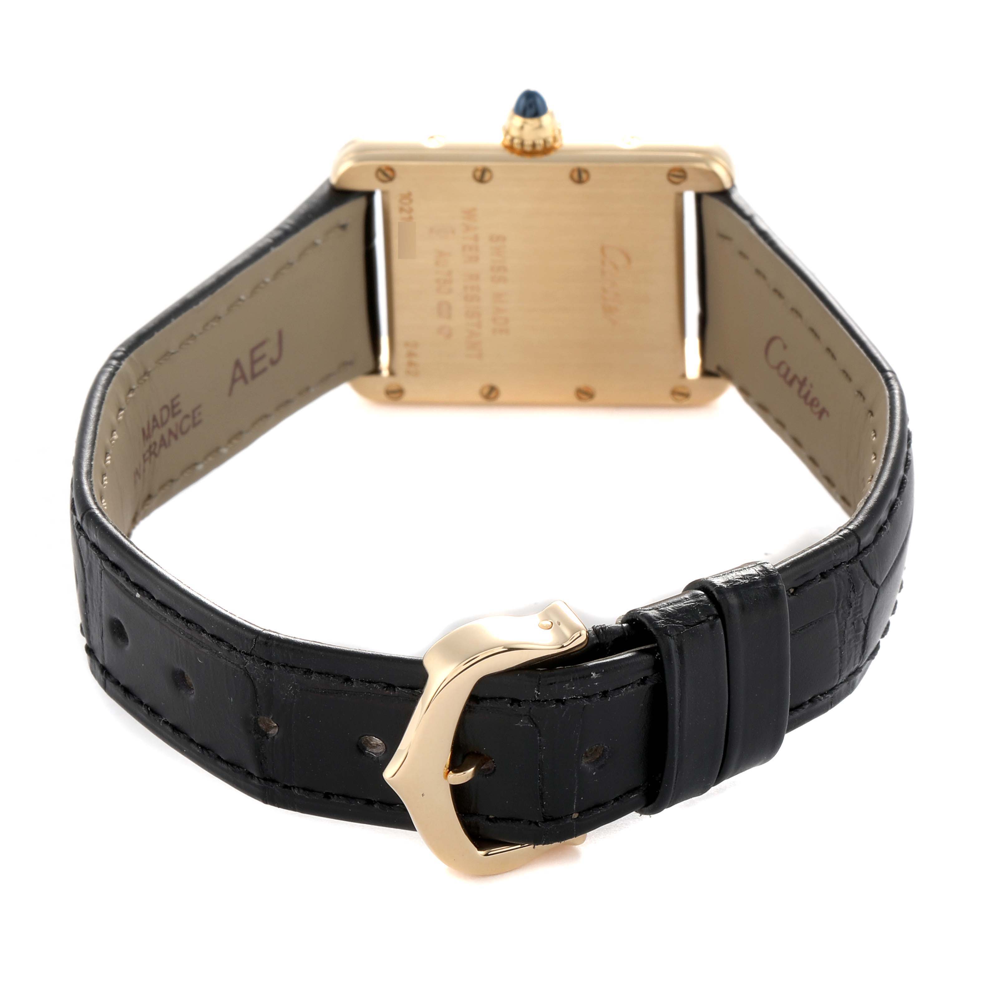 The image shows the back of the Cartier Tank Louis W1529856 Women's Yellow Gold Silver Dial watch, highlighting the case back, strap, buckle, and crown.