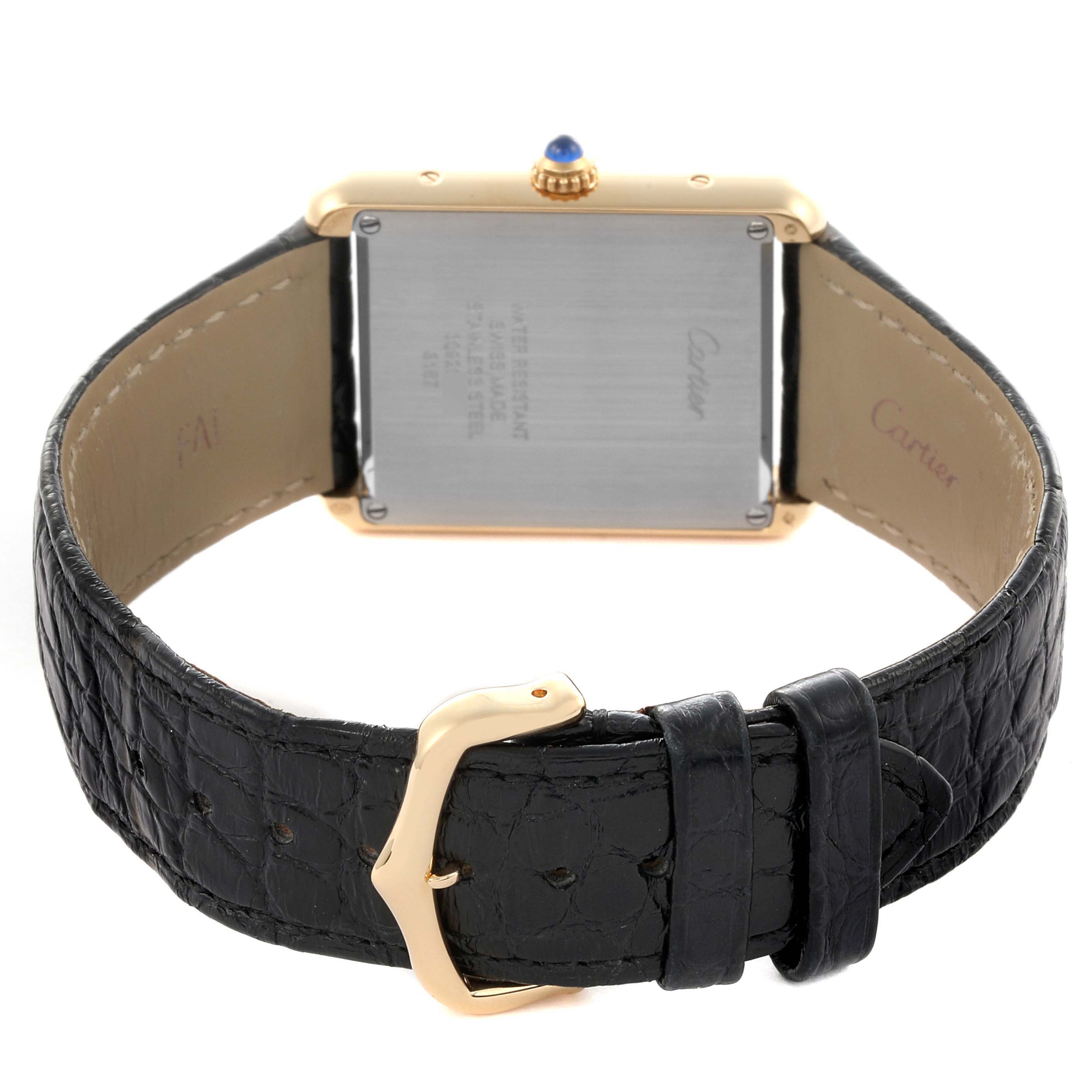 The image shows the back of a Cartier Tank Solo W5200004 Men's Steel and Gold (two tone) Silver Dial W5200004 Men's Steel and Gold (two tone) Silver Dial watch, highlighting the case back, leather strap, and buckle.