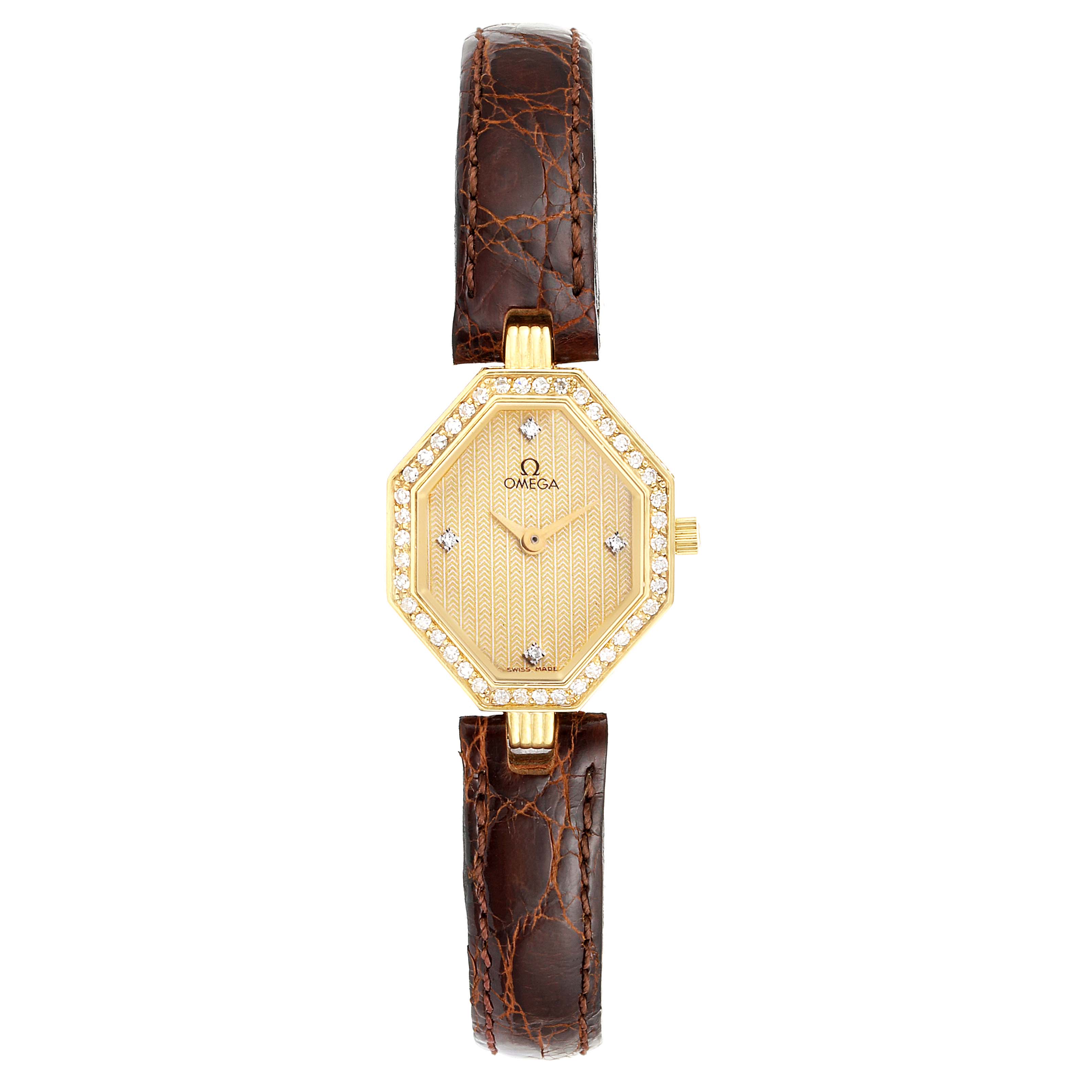 The image shows a front view of the Omega 1450 Women's Yellow Gold Champagne Dial 1450 Women's Yellow Gold Champagne Dial DeVille Mini Yellow Gold Diamond Cocktail Ladies Watch 1450 Unworn model with a brown leather strap.