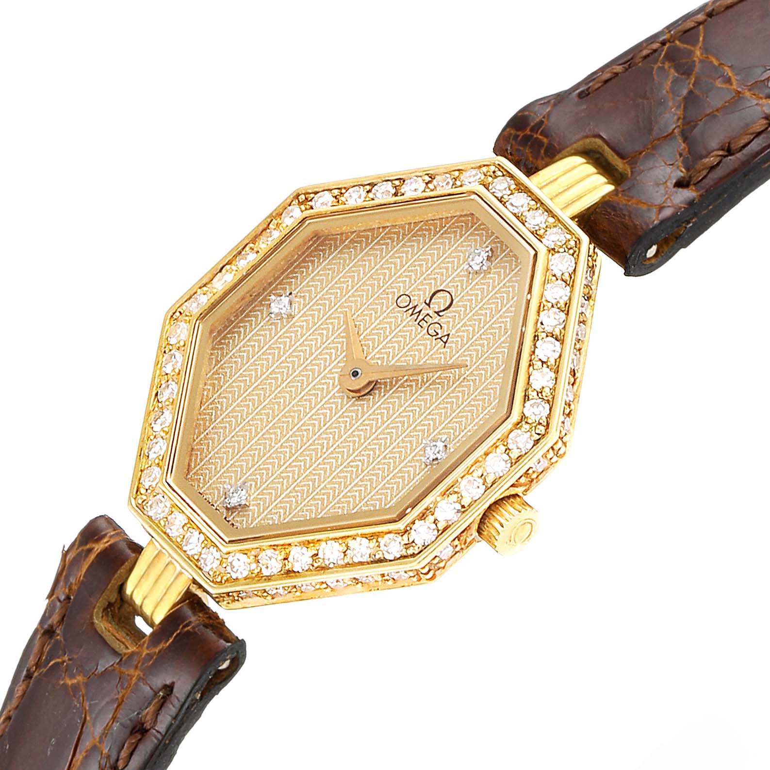 The Omega 1450 Women's Yellow Gold Champagne Dial 1450 Women's Yellow Gold Champagne Dial DeVille Mini Yellow Gold Diamond Cocktail Ladies Watch 1450 is shown from an oblique angle, displaying its face and leather strap.
