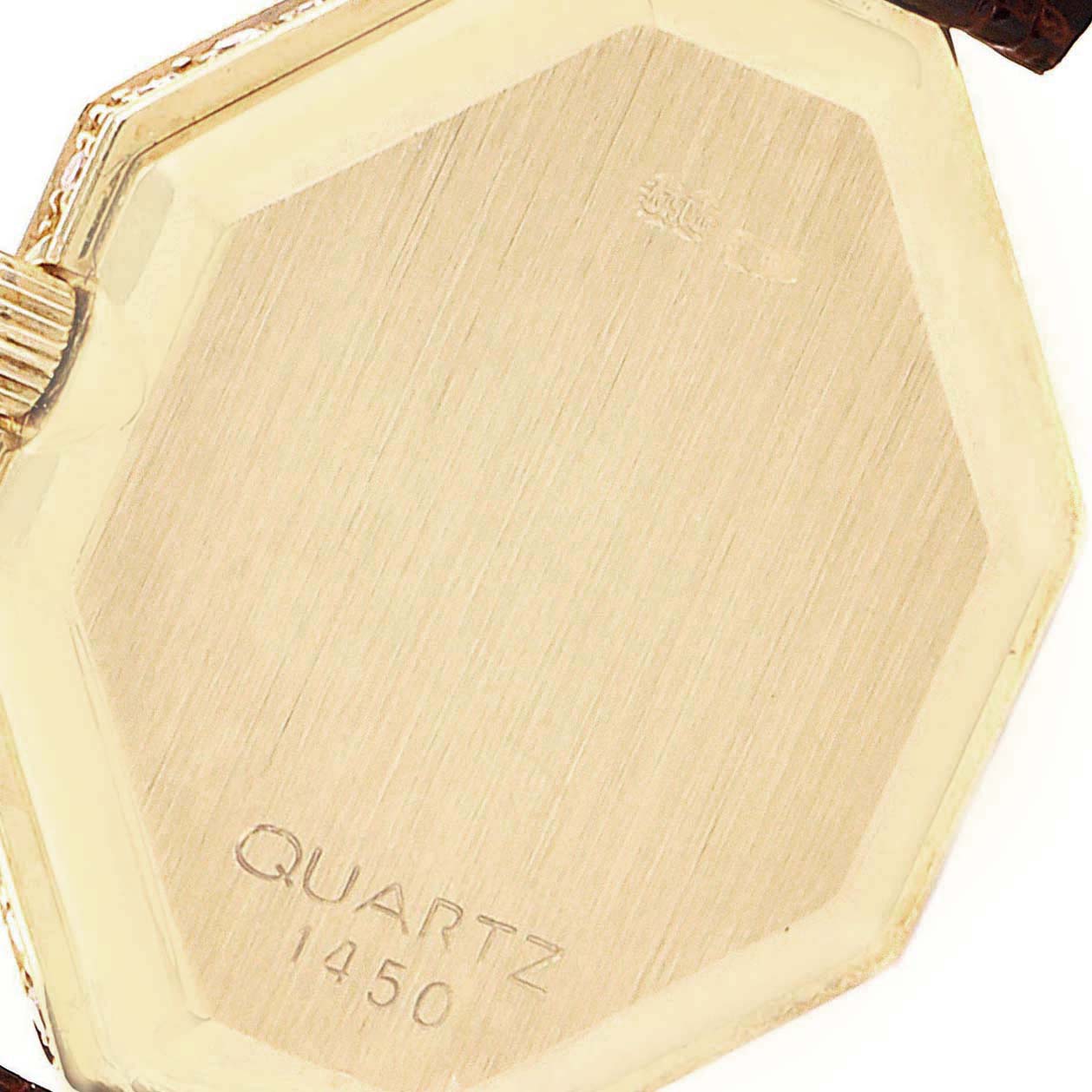 The image shows the back case of an Omega 1450 Women's Yellow Gold Champagne Dial 1450 Women's Yellow Gold Champagne Dial DeVille Mini Yellow Gold Diamond Cocktail Ladies Watch model 1450.