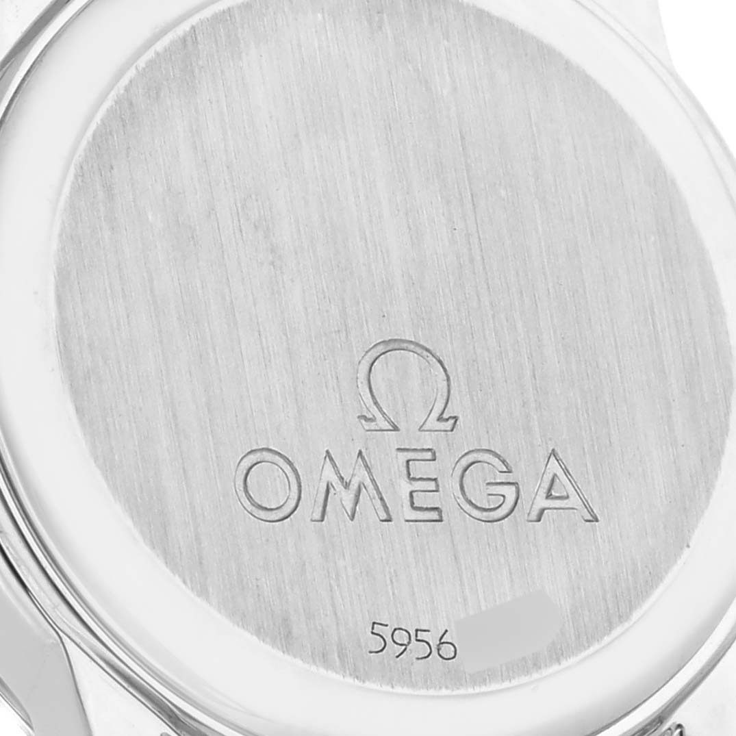 The image shows the back case of the Omega 4575.76 Women's Stainless Steel Mother of Pearl Dial 4575.76 Women's Stainless Steel Mother of Pearl Dial DeVille Prestige 4575.76, displaying the Omega 4575.76 Women's Stainless Steel Mother of Pearl Dial 4575.76 Women's Stainless Steel Mother of Pearl Dial logo and some numbers.