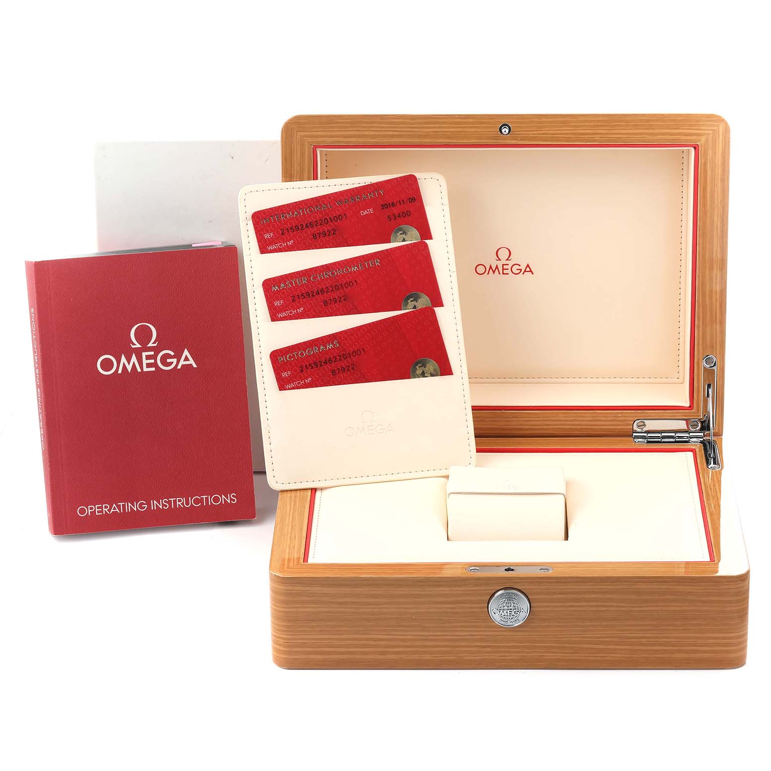 The image shows the Omega Planet Ocean 215.92.46.22.01.001 Men's Ceramic Black Dial 215.92.46.22.01.001 Men's Ceramic Black Dial watch box, instruction booklet, and warranty cards, all from a top-down angle.