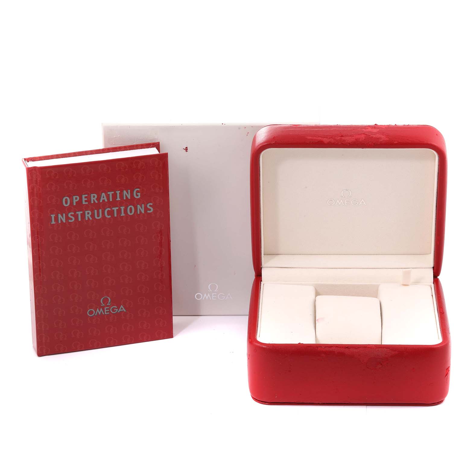 The image shows the Omega Aqua Terra 220.10.40.20.03.001 Men
s Stainless Steel Blue Dial 220.10.40.20.03.001 Men
s Stainless Steel Blue Dial model watch accessories which include a red operating instructions booklet, a white box, and an open red watch box.