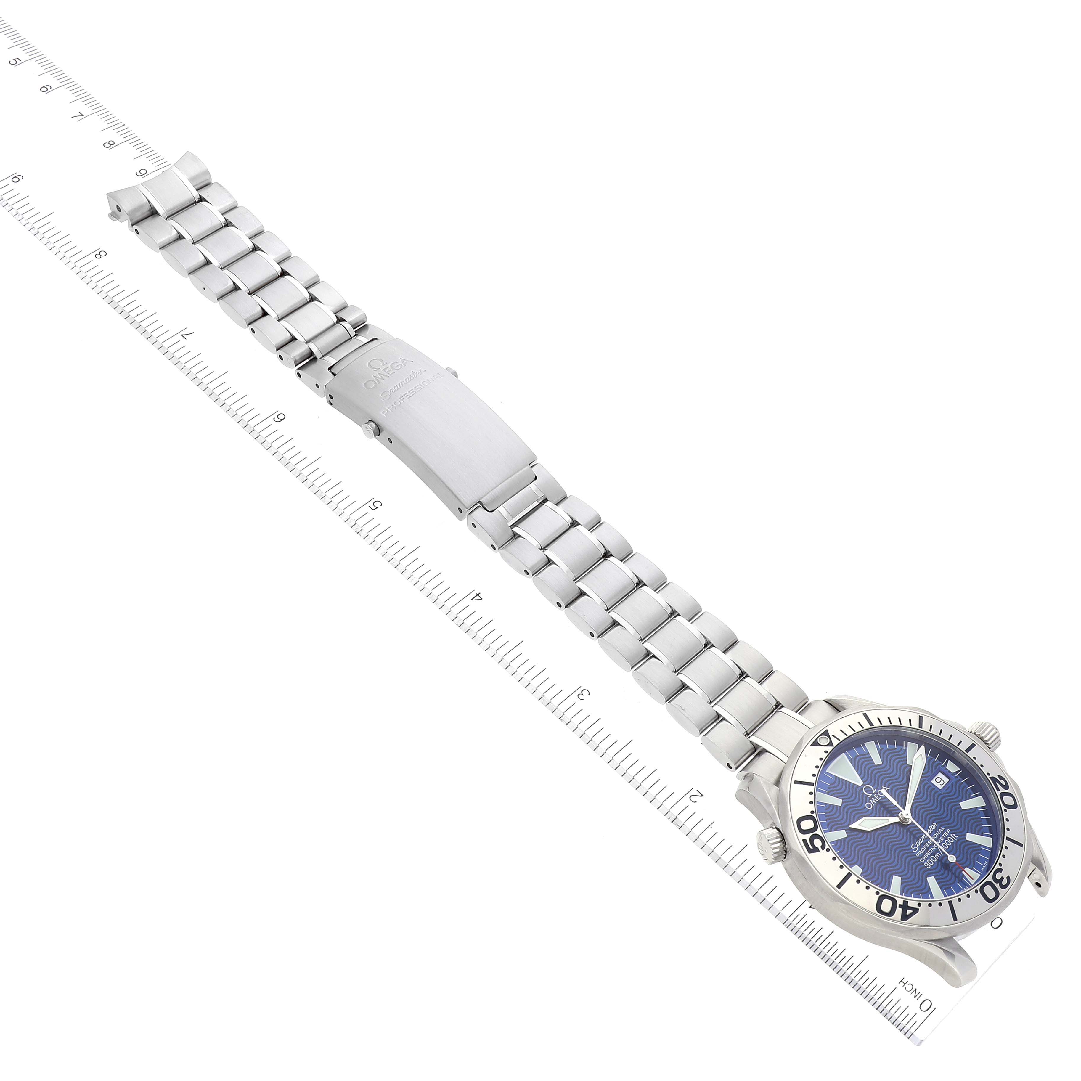 The Omega Seamaster 2255.80.00 Men's Stainless Steel Blue Dial 2255.80.00 Men's Stainless Steel Blue Dial watch is displayed flat, showing the face, bezel, bracelet, and clasp, alongside a ruler for size reference.