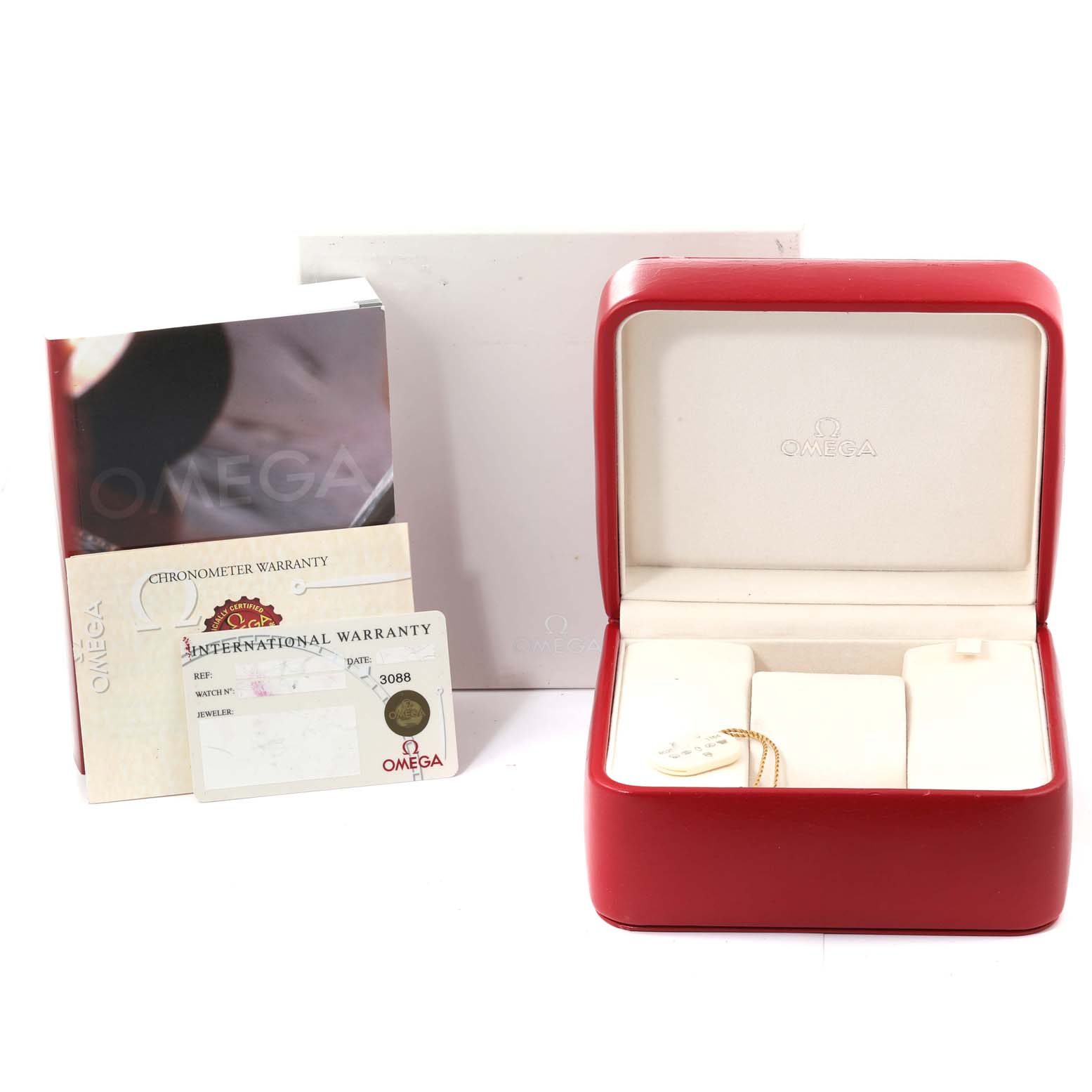 The image shows the box, warranty cards, and manual for an Omega Seamaster 2598.20.00 Men's Stainless Steel White Dial 2598.20.00 Men's Stainless Steel White Dial watch.