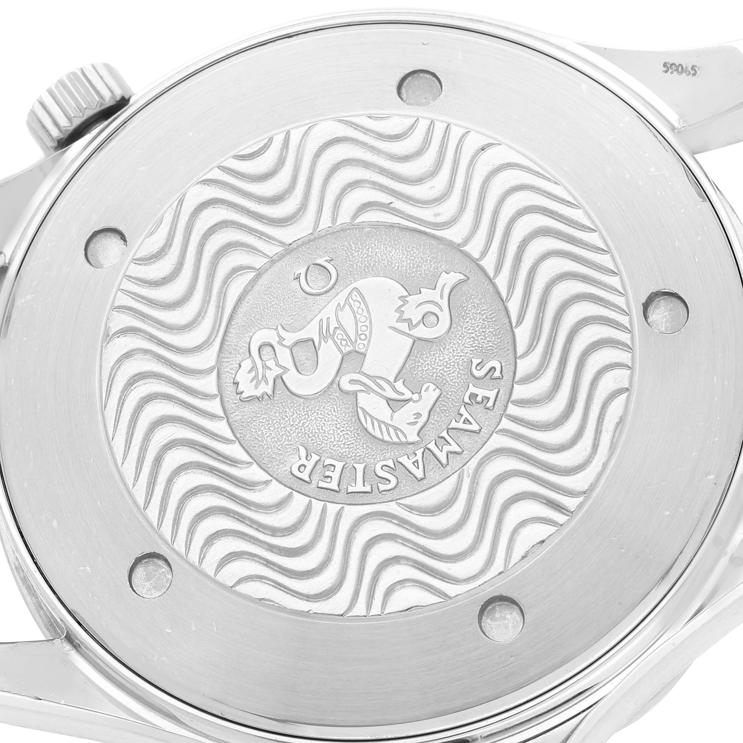 This image shows the case back of an Omega Seamaster 2265.80.00 Men's Stainless Steel Blue Dial 2265.80.00 Men's Stainless Steel Blue Dial watch, displaying an engraved emblem and wavy pattern.