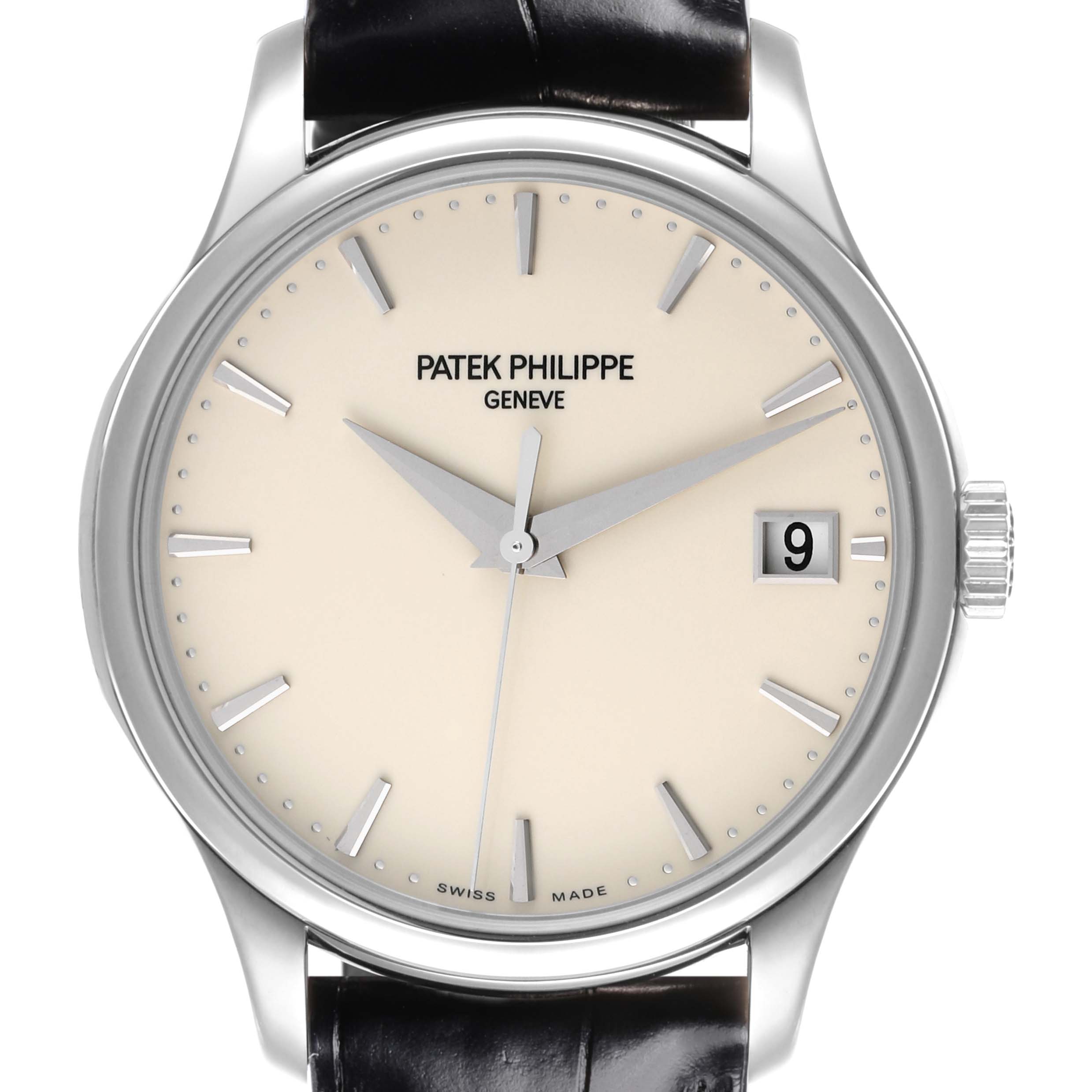 The Patek Philippe Calatrava 5227G-001 Men's White Gold Beige Dial 5227G-001 Men's White Gold Beige Dial watch is shown from the front, highlighting the dial, hands, indices, and date window.