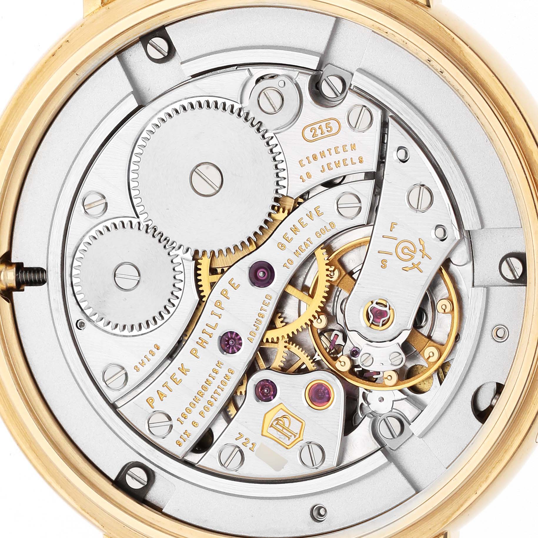 The image shows the intricate movement components of the Patek Philippe Calatrava 7121J-001 Women's Yellow Gold Silver Dial watch from a back view.