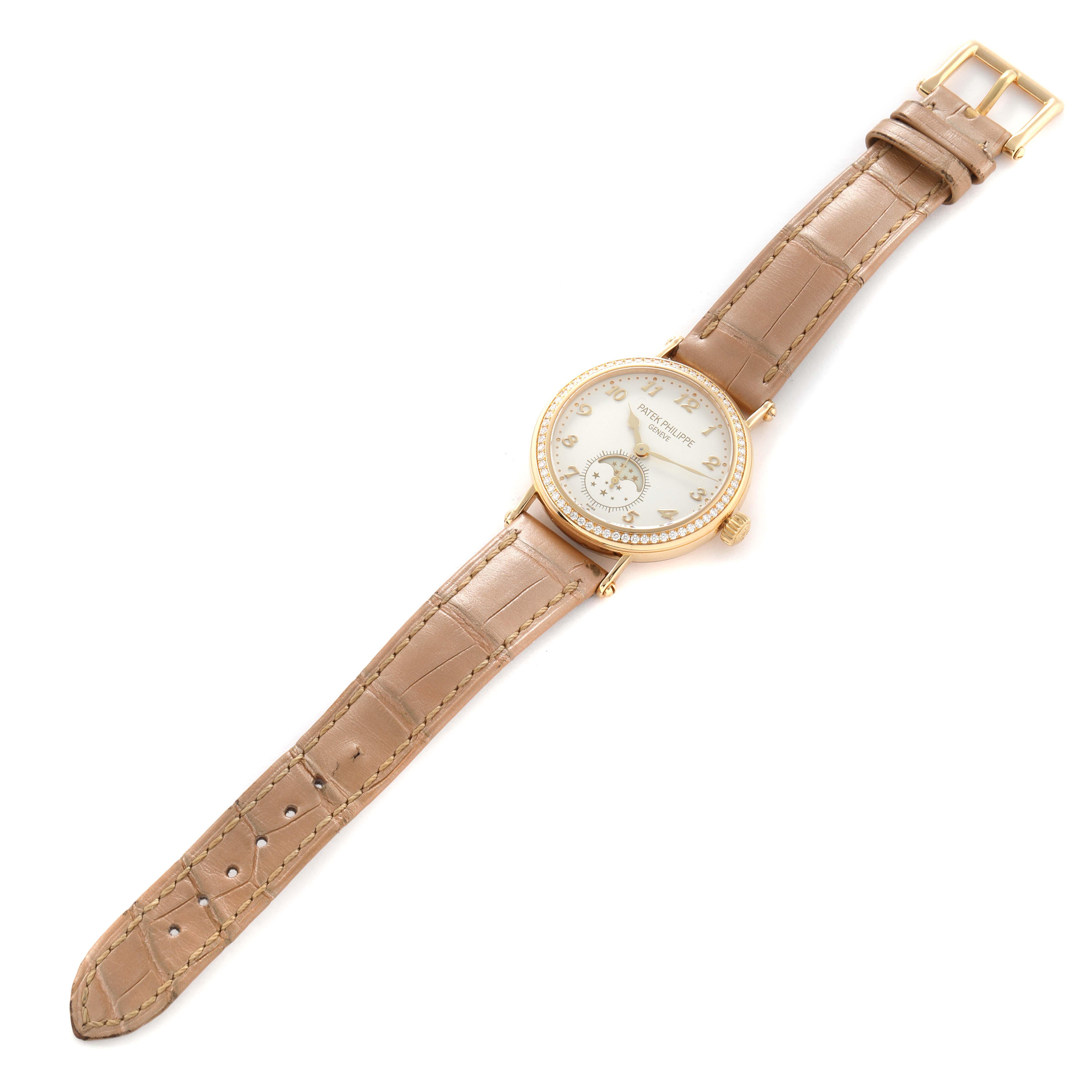 The image shows a Patek Philippe Calatrava 7121J-001 Women's Yellow Gold Silver Dial watch angled diagonally, displaying the dial, bezel, crown, and full leather strap.